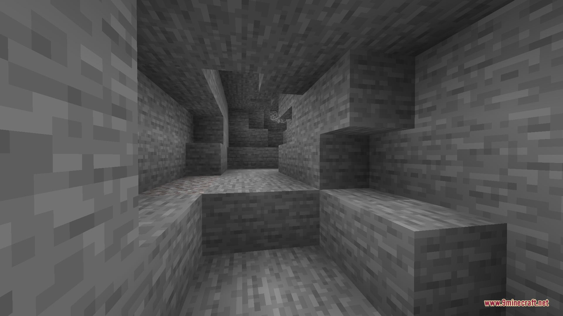 A brightly lit stone cave interior showing full visibility without any torches