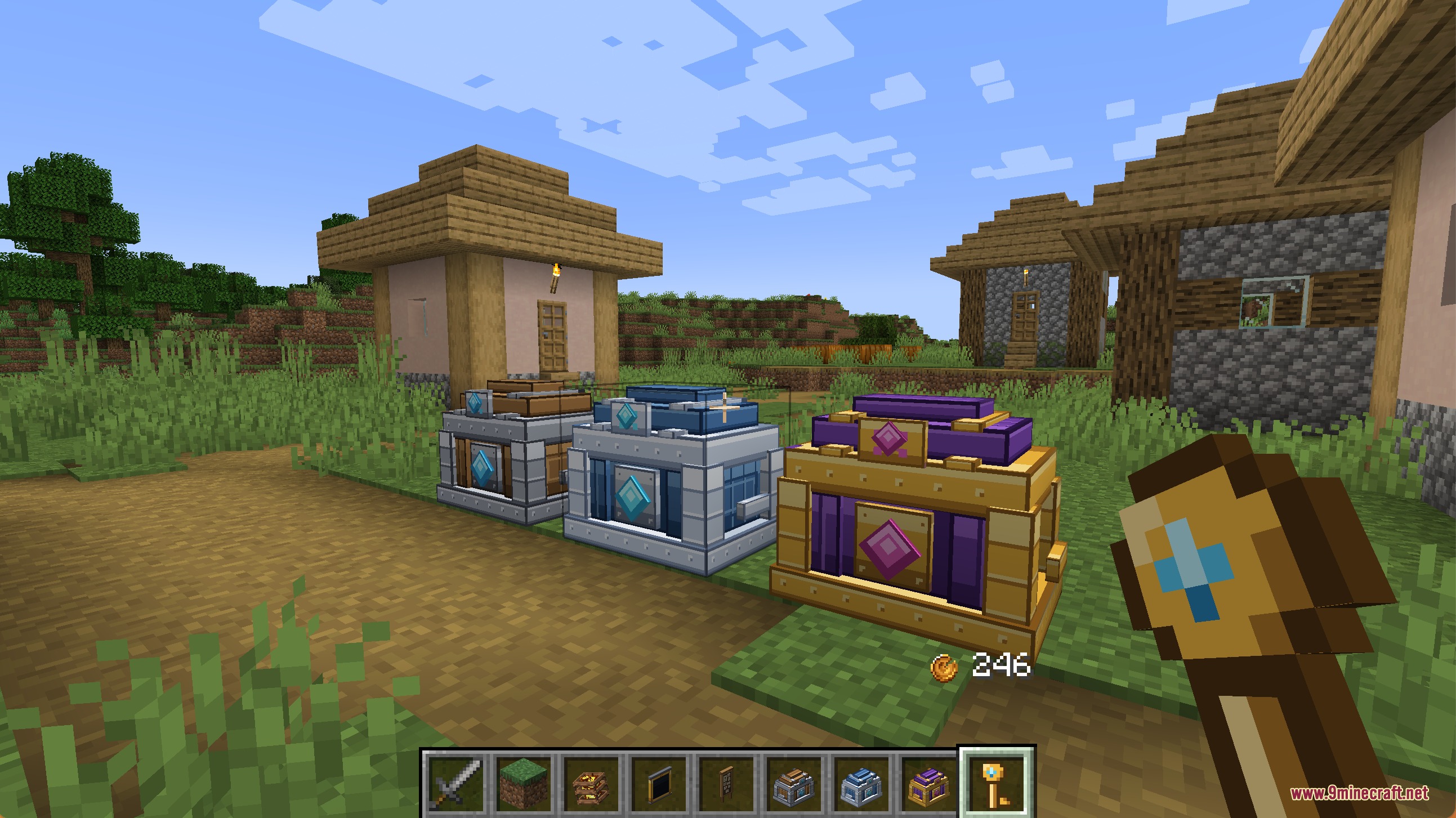 Notches Currency Mod Screenshot 7 A player holding a key near three colorful treasure crates in Minecraft
