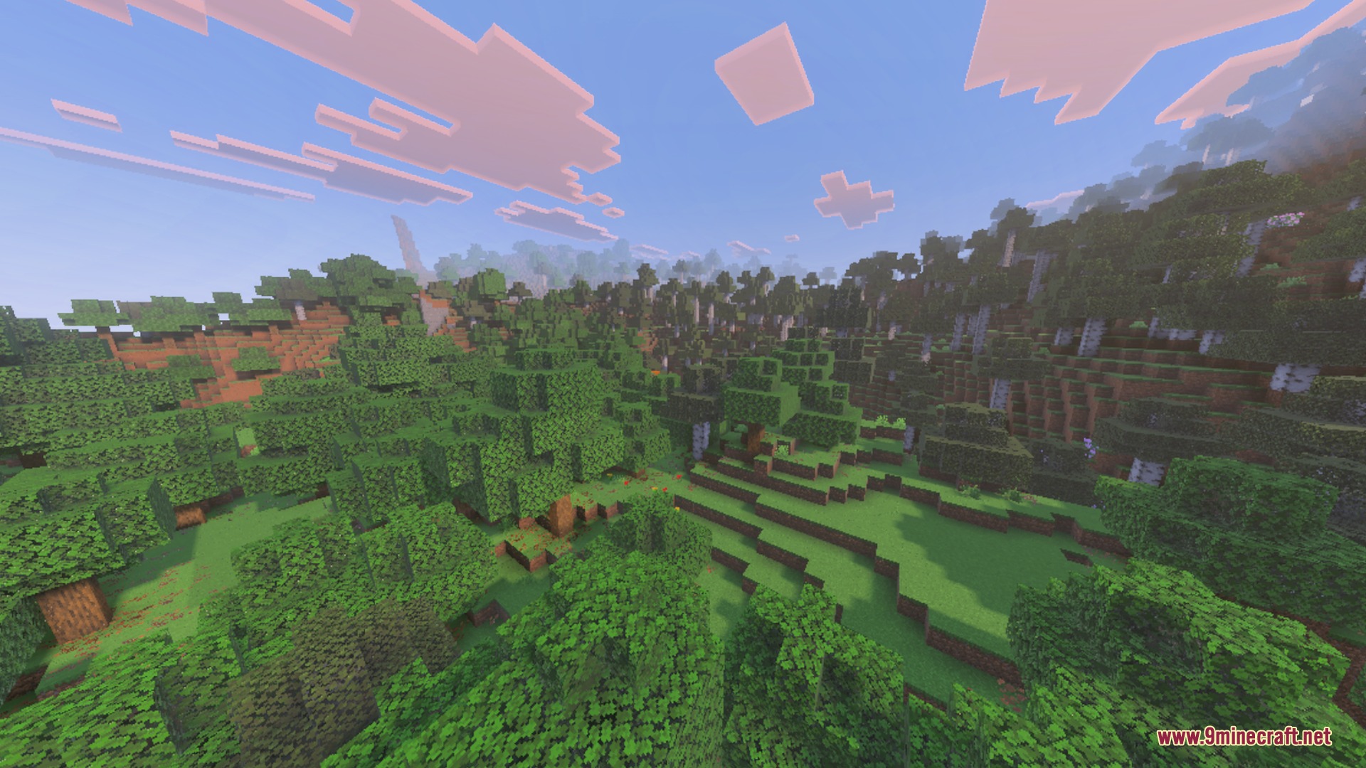 A vast Minecraft landscape featuring lush green hills and soft pink sunset clouds
