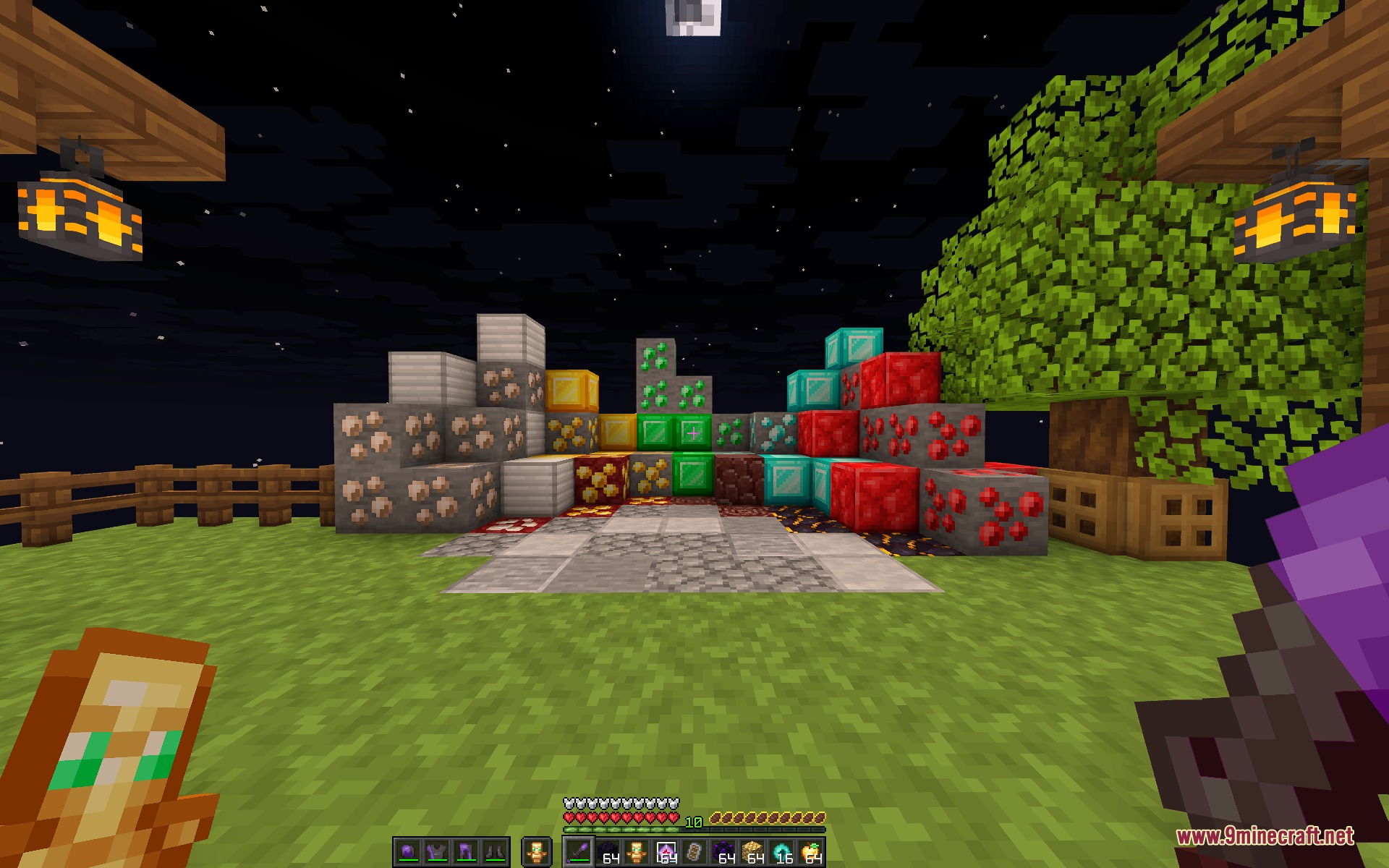 Various Minecraft ore and mineral blocks stacked together on a grassy field