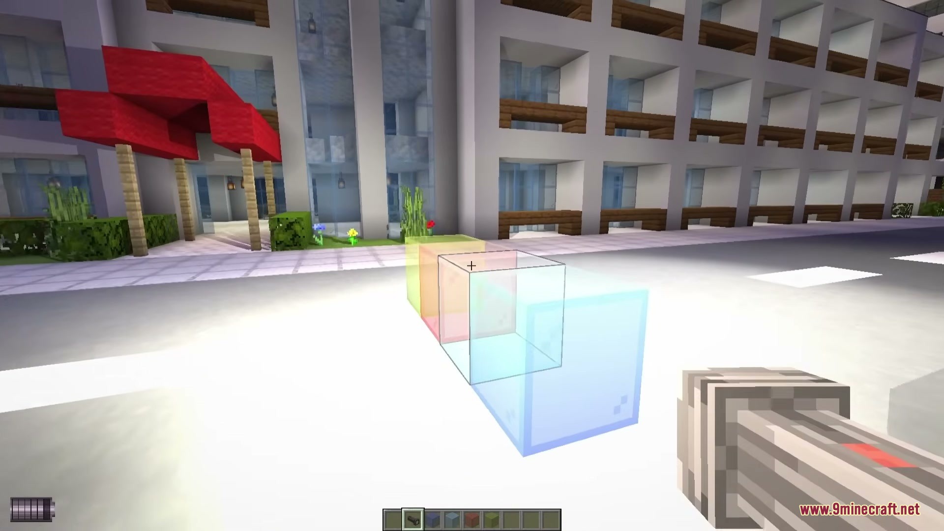 Omega Flashlight Mod Screenshot 5 A player uses a tactical flashlight to shine light through colored glass blocks