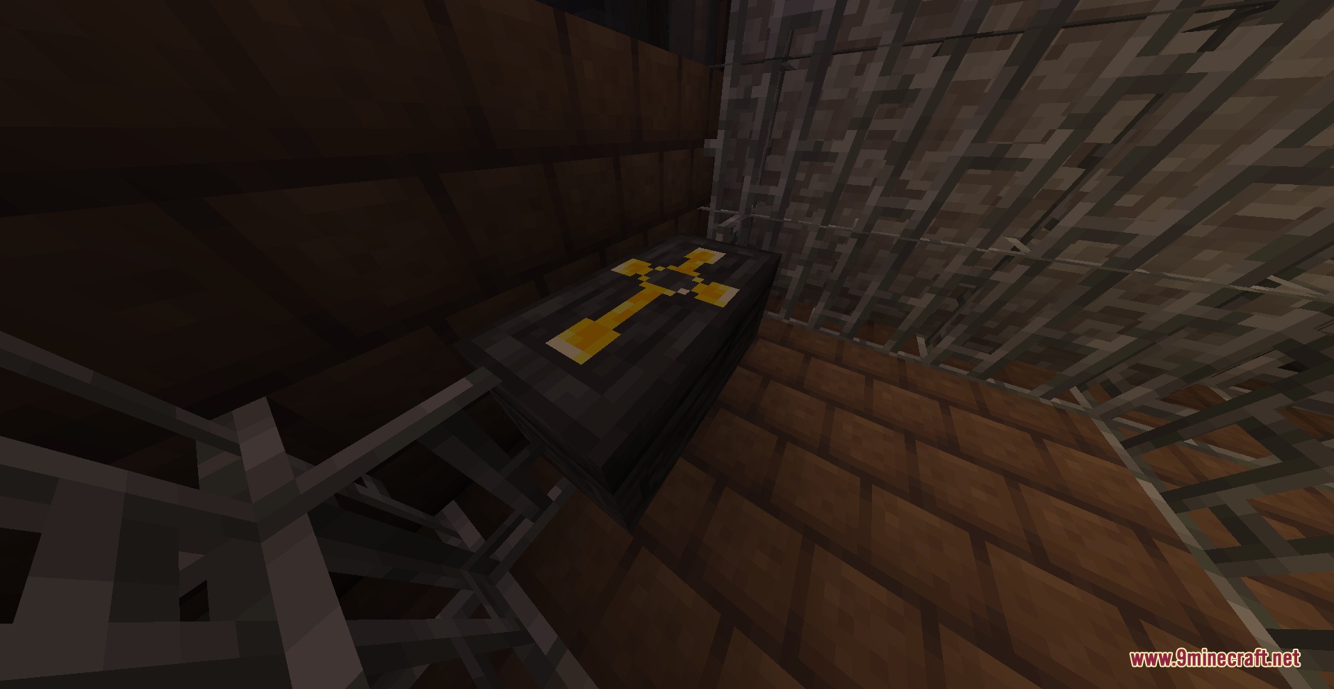 Ophanim Omen Mod Screenshot 6 Black coffin with a yellow cross inside a dark stone room