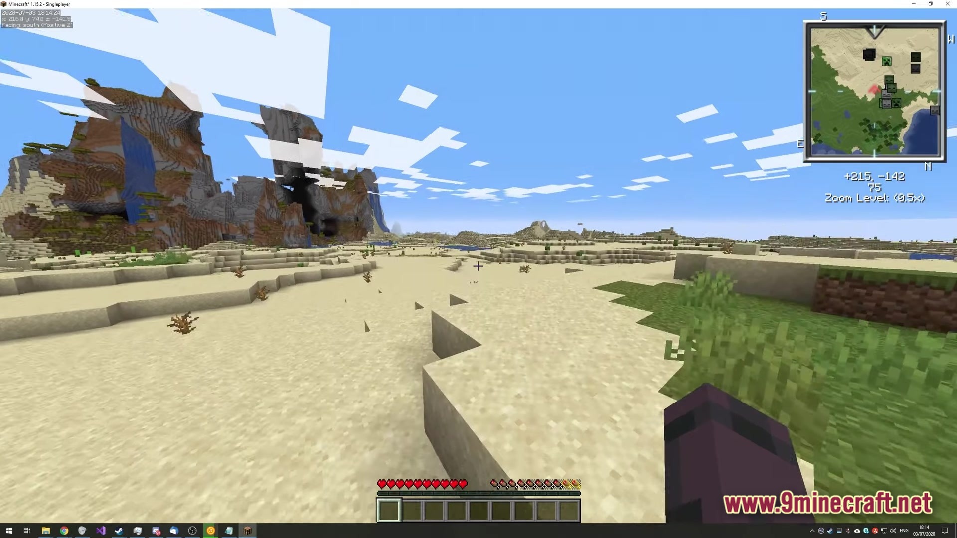 Opti Fine For Fabric Modpack Screenshot 3 A first-person view of a desert biome adjacent to mountains with an active mini-map overlay