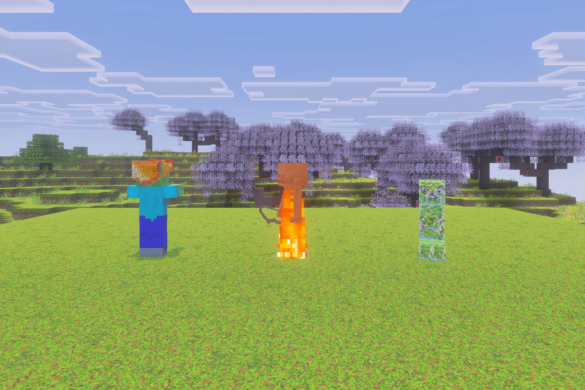 A zombie burning skeleton and creeper standing on a grassy field