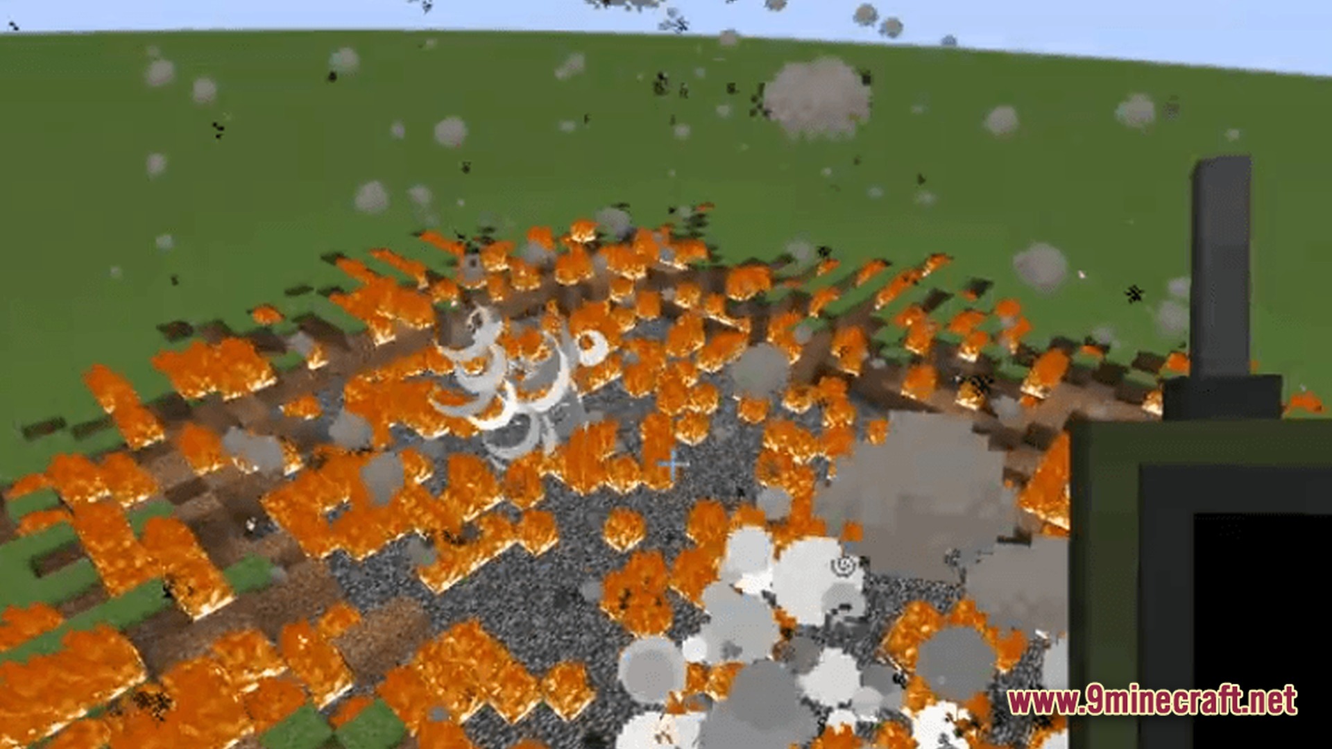 Orbital Fallout Alpha Modpack Screenshot 2 A large explosion creates fire and smoke across a flat grassy landscape in Minecraft