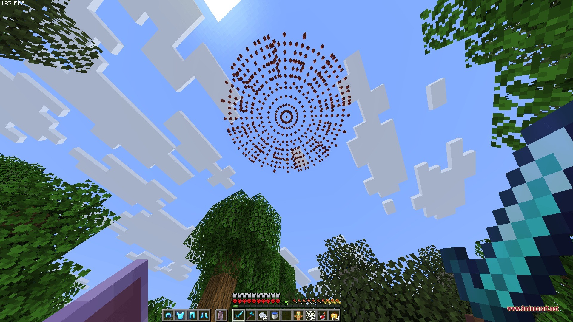 Player looks up at a red orbital strike cannon blast in the sky