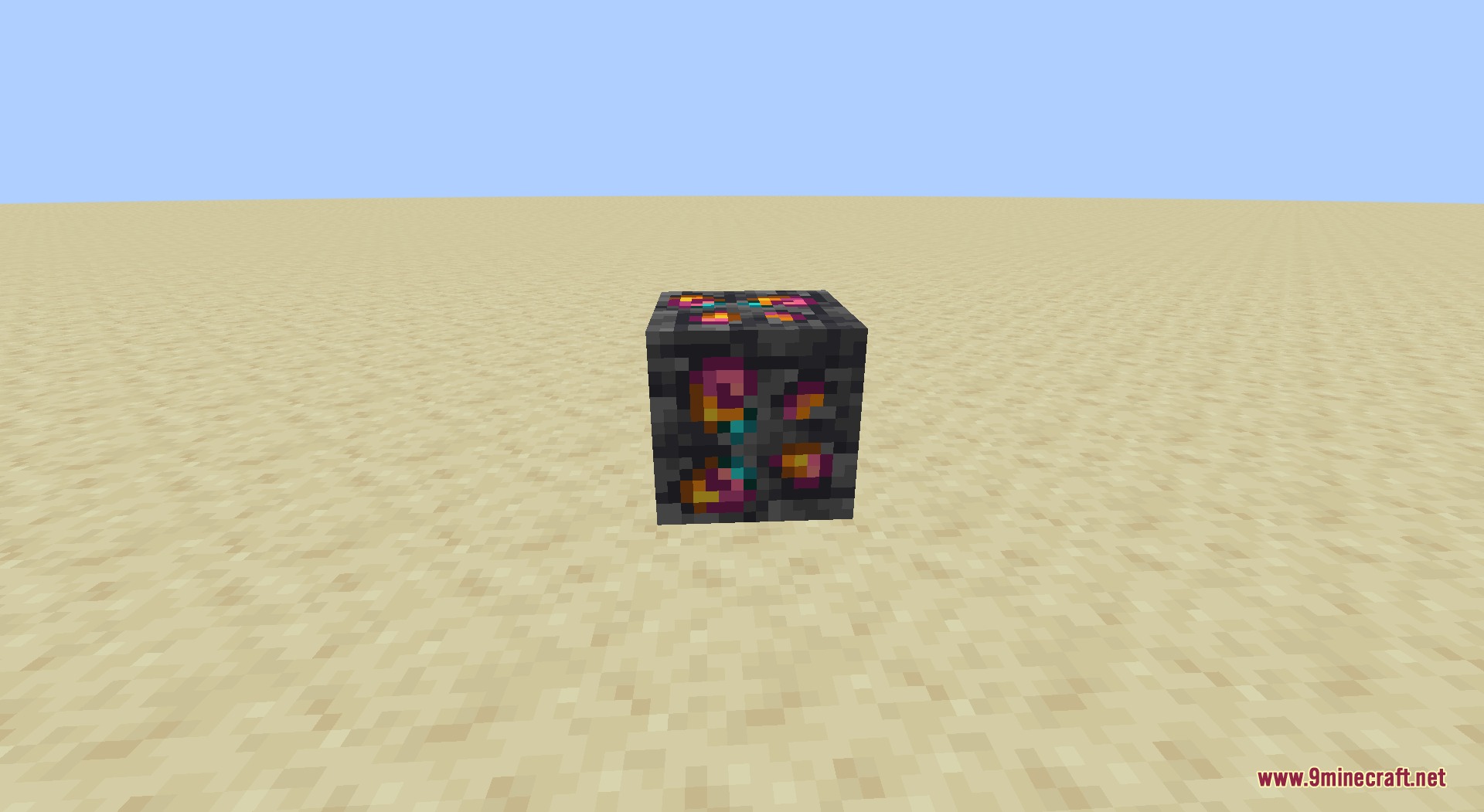 Ore Genesis Mod Screenshot 4 Vibrant colorful ore block from the Ore Genesis mod on flat sand