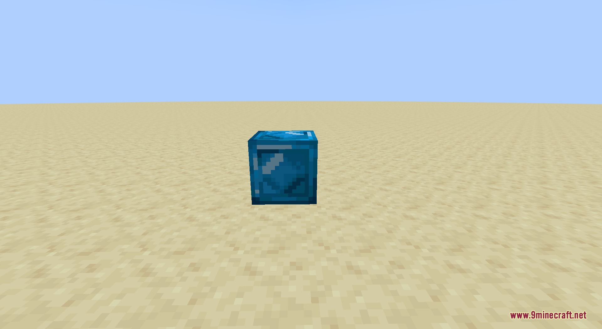 Ore Genesis Mod Screenshot 7 A decorative block made of sapphire placed on a flat sandy surface