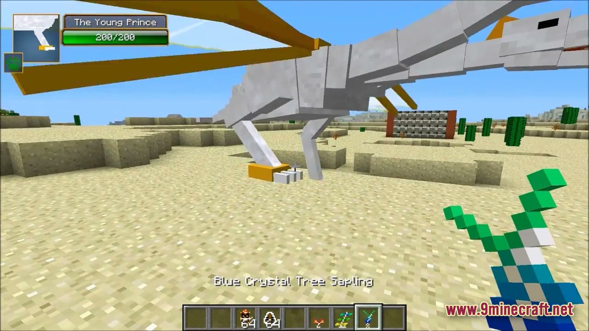 Ore Spawn Adventuree Modpack Screenshot 4 A player holds a Blue Crystal Tree Sapling while standing near The Young Prince dragon mob