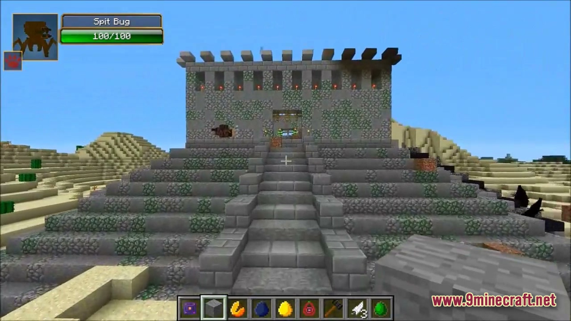 Ore Spawn Adventuree Modpack Screenshot 6 A stone brick pyramid structure stands in a desert biome with a Spit Bug health bar visible