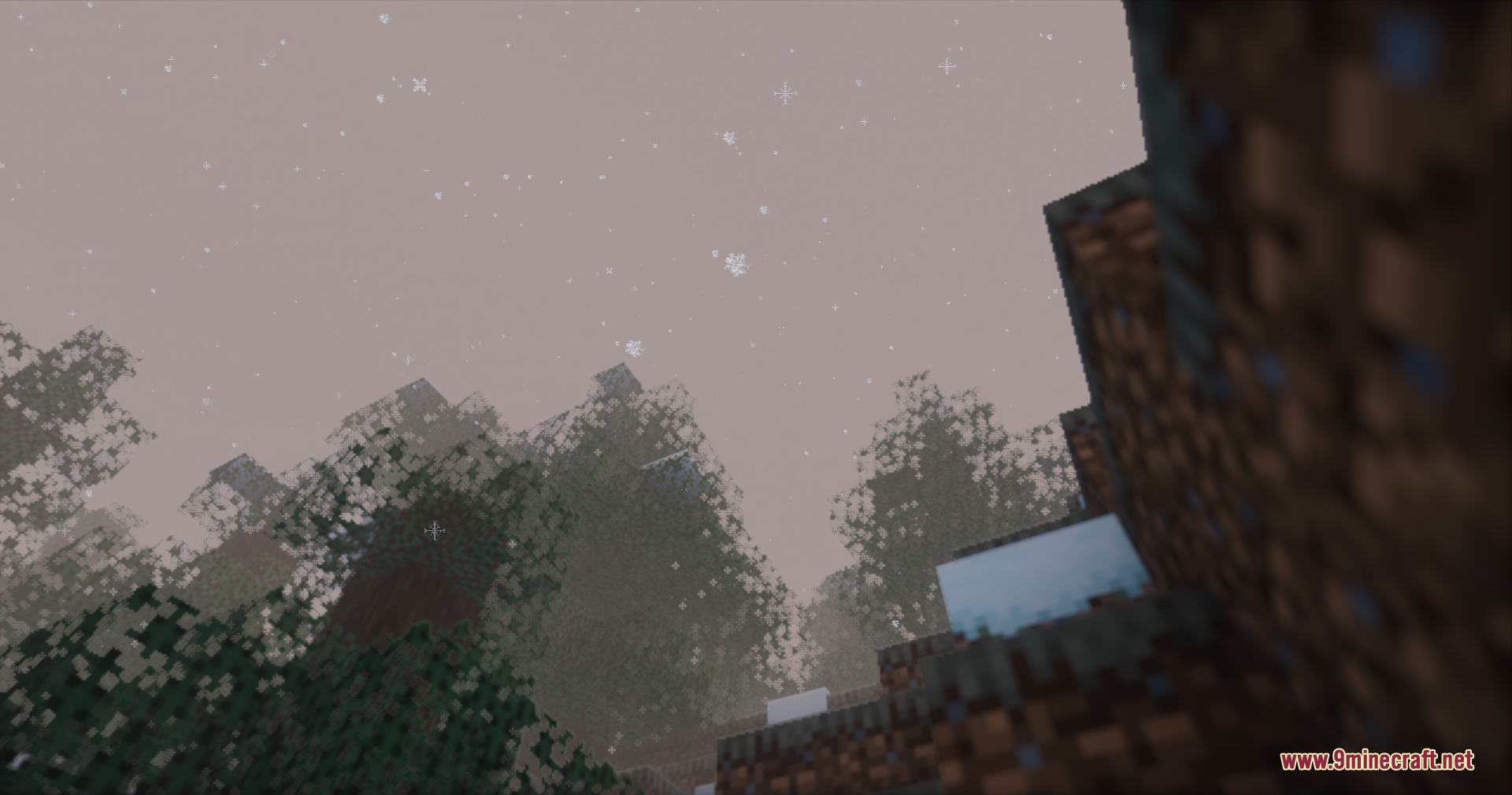 PMW Precipitation Redone Resource Pack Screenshot 2 Looking up at detailed snow particles falling from the sky in Minecraft