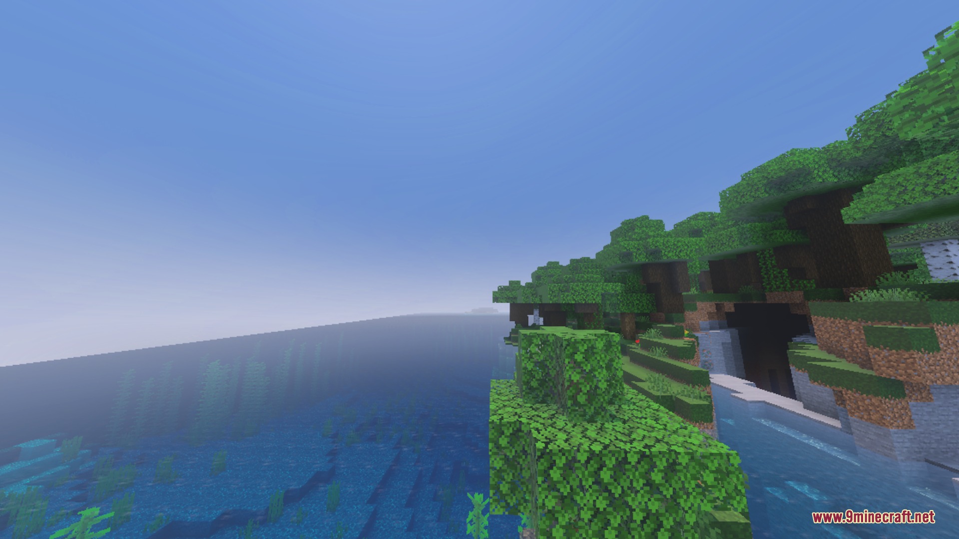 Vibrant full grass side textures create a seamless green landscape along the coast