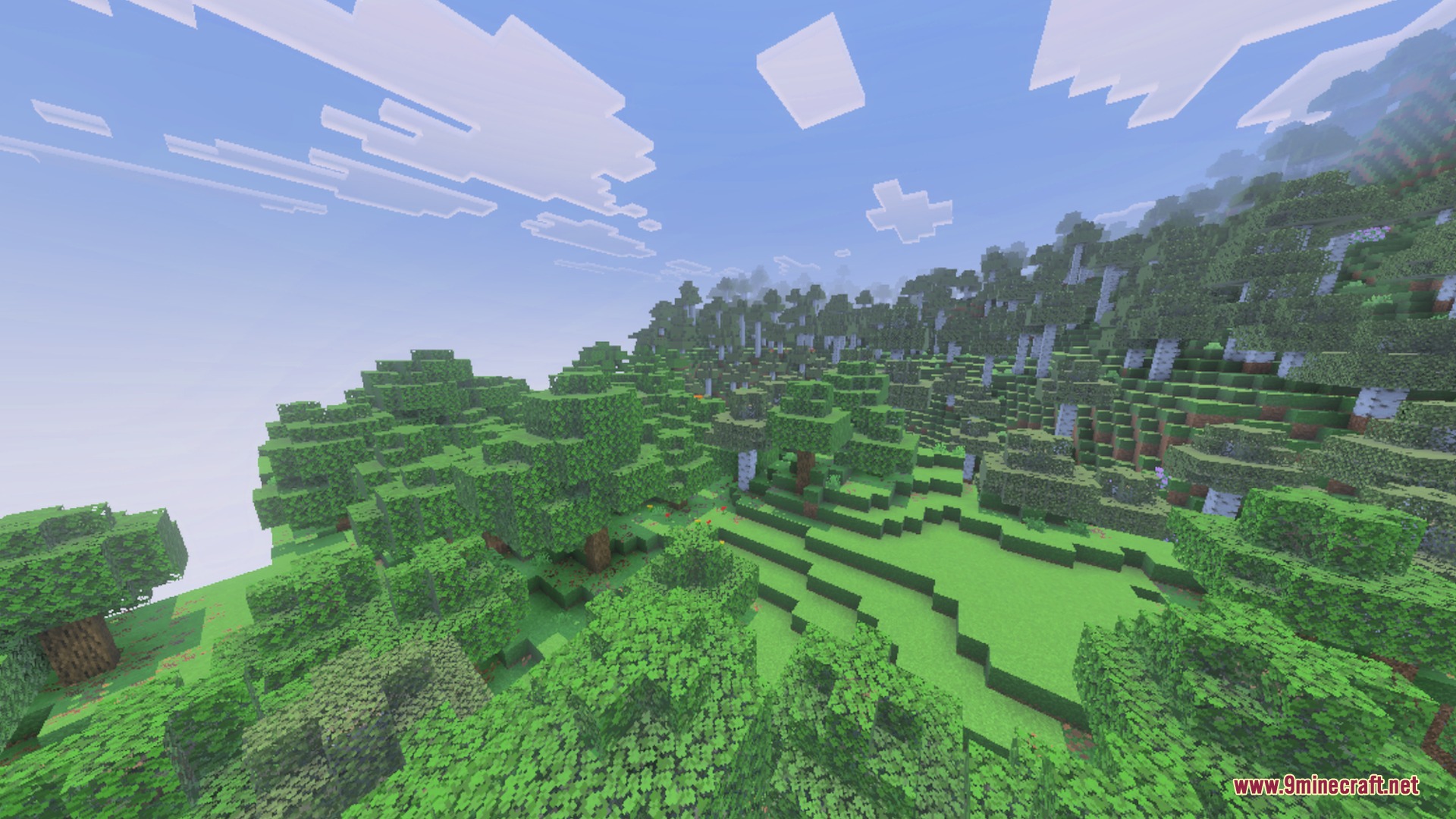 Lush green hills and forests showcasing seamless grass textures under a bright sky