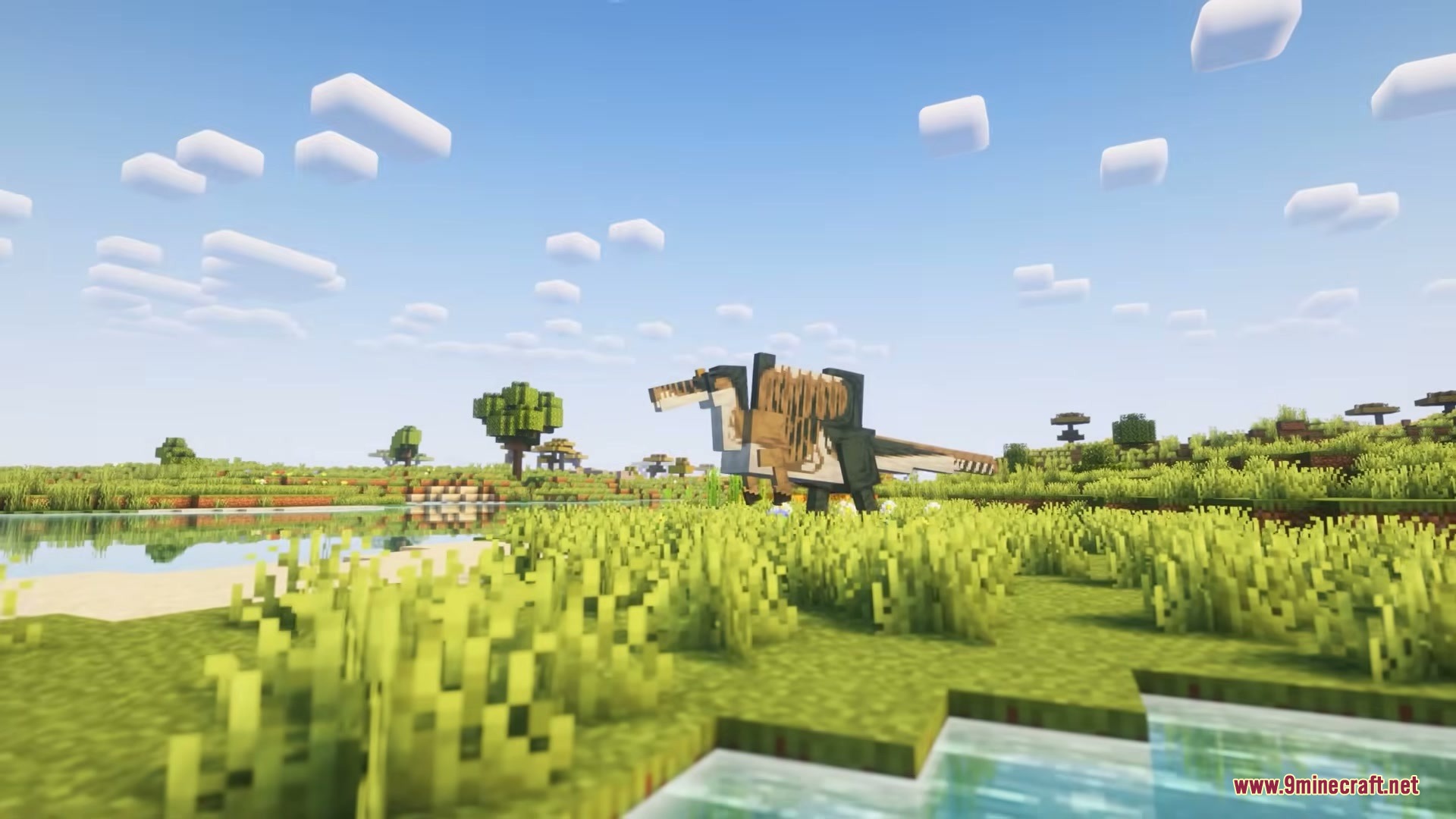 Pelagic Prehistory Mod Screenshot 6 A Spinosaurus stands in a grassy field next to a calm river