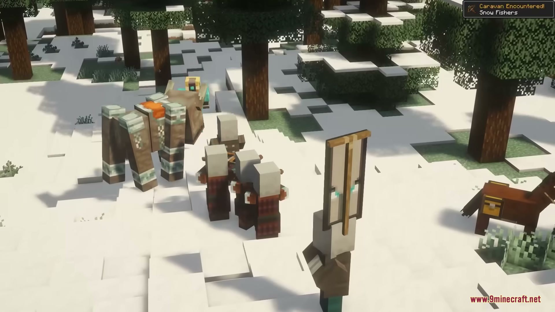 Pillager Caravans Mod Screenshot 5 A group of pillagers and a ravager walking through a snowy forest