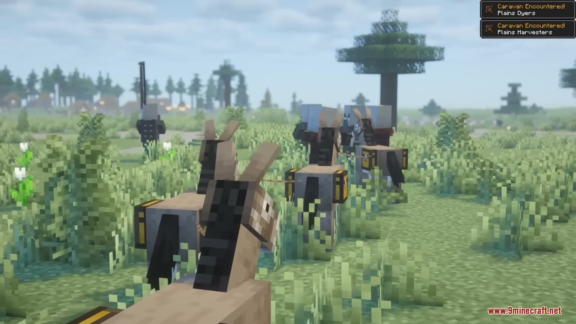Pillager Caravans Mod Screenshot 7 A caravan of donkeys carrying chests travels through a grassy plains biome