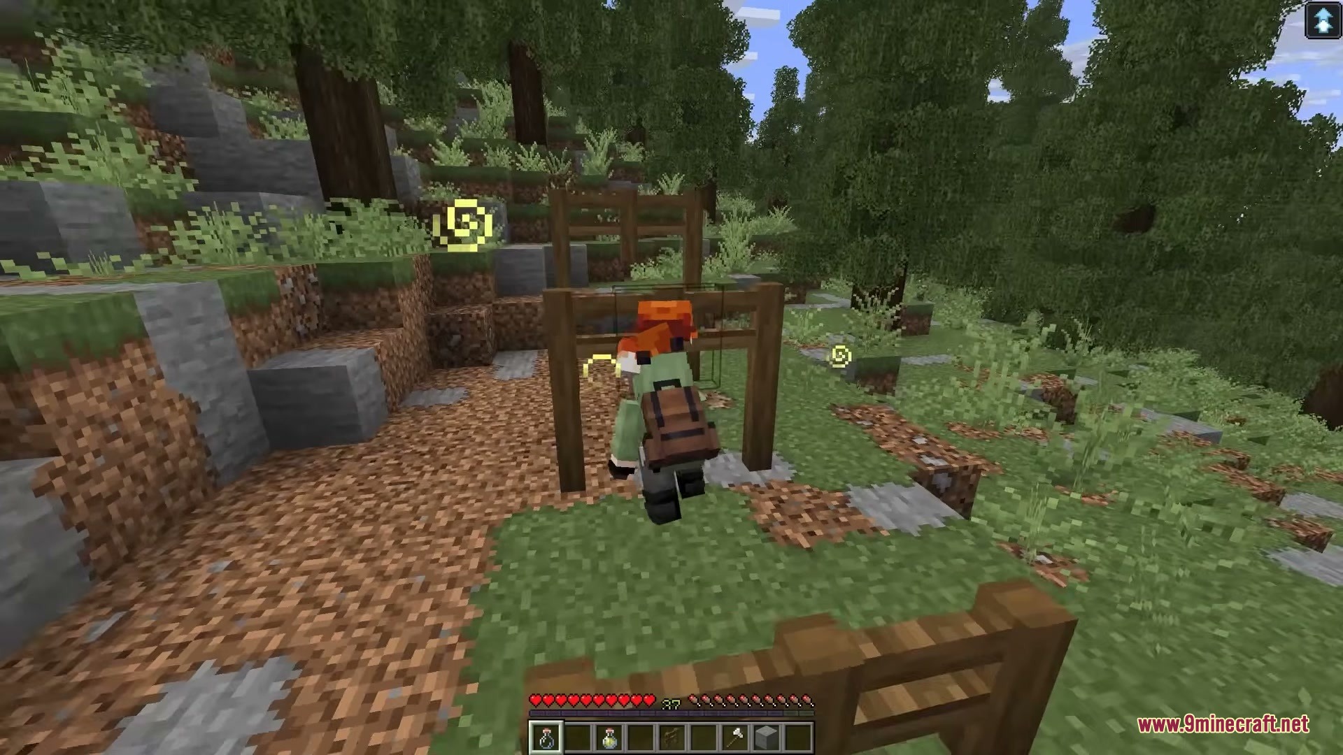Player Charge Jump Mod Screenshot 6 A player leaping over a wooden fence using the horse style jump bar