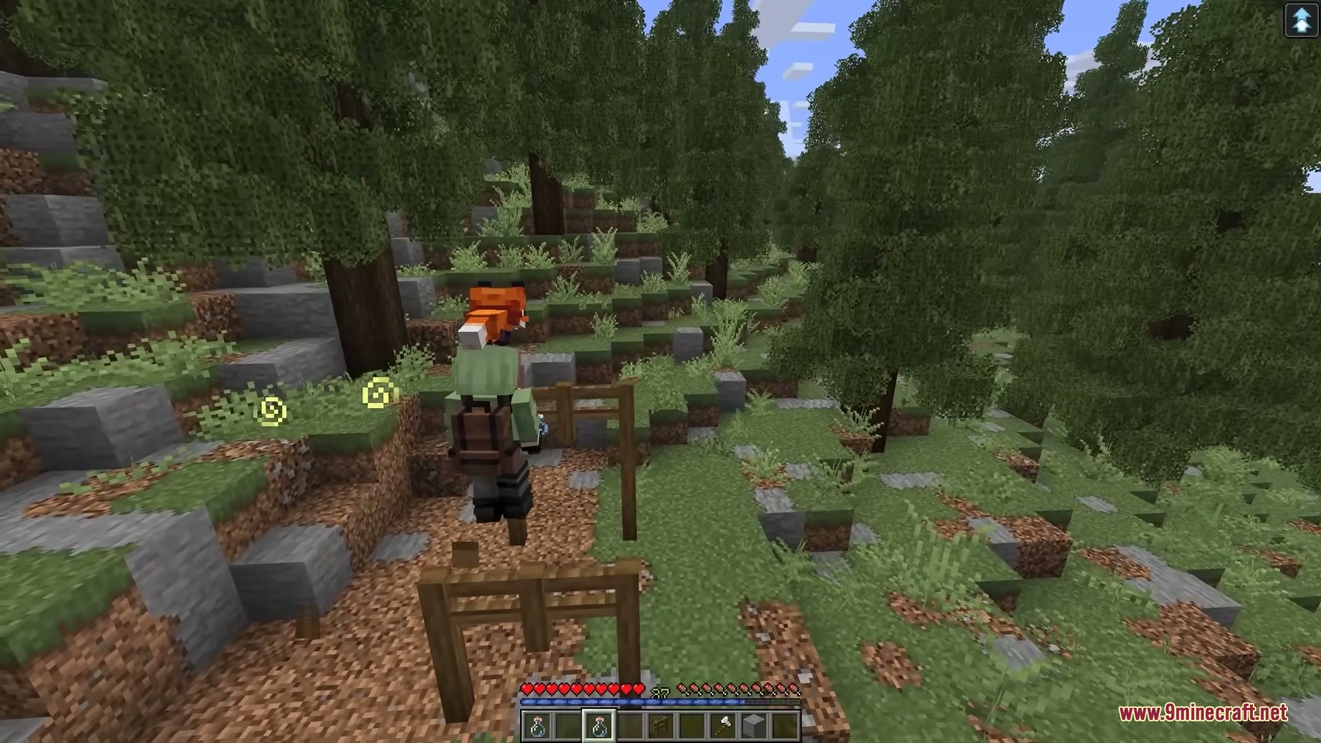 Player Charge Jump Mod Screenshot 8 Player leaping over a wooden fence using a charged jump mechanic in Minecraft