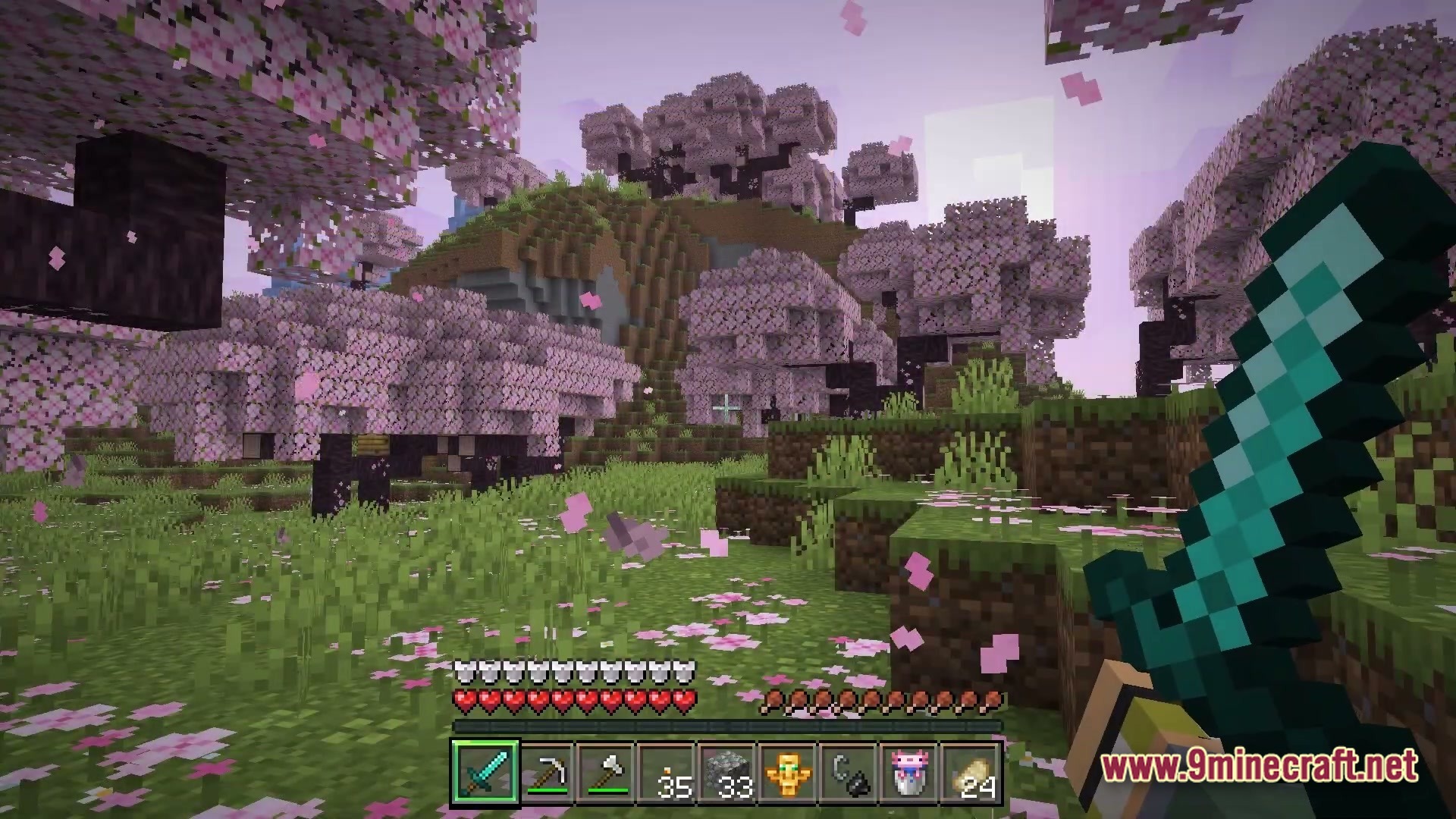 Polished Realm Essence Modpack Screenshot 6 A player holds a diamond sword while exploring a cherry blossom grove biome with falling petals