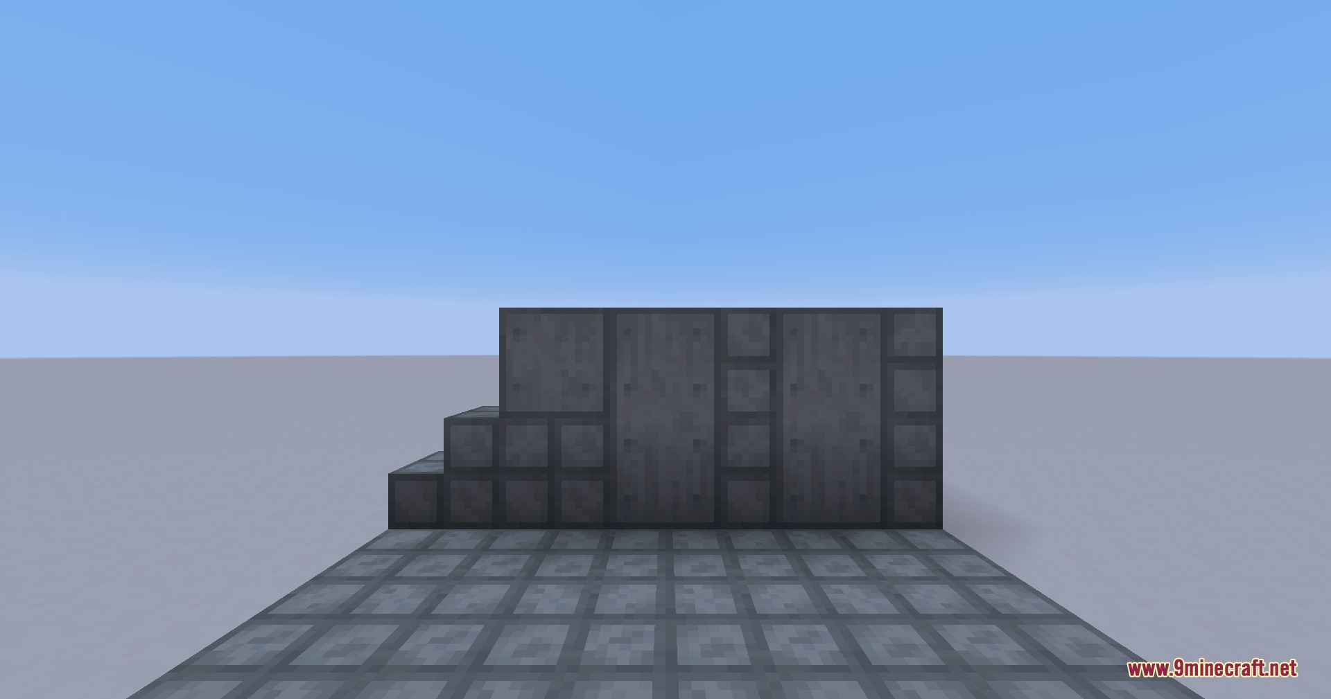 Dark grey lunecast and blackplate blocks arranged in a simple test chamber