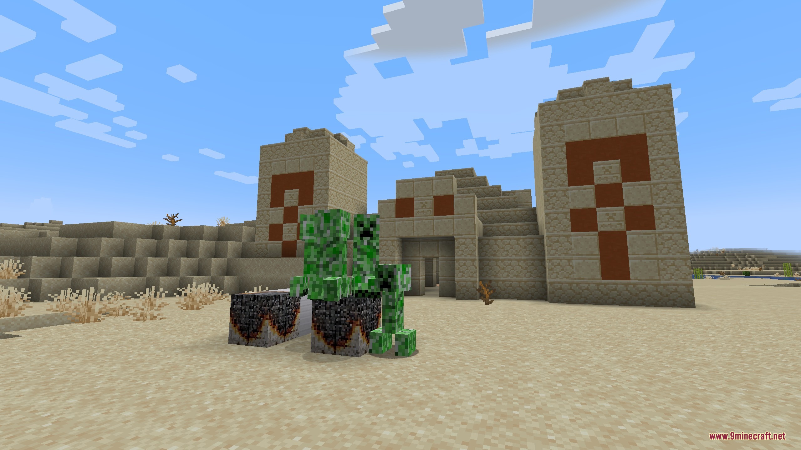Pouch & Paper by Spekarchik Mod Screenshot 7 Creepers gathering around burnt paper blocks in front of a desert temple