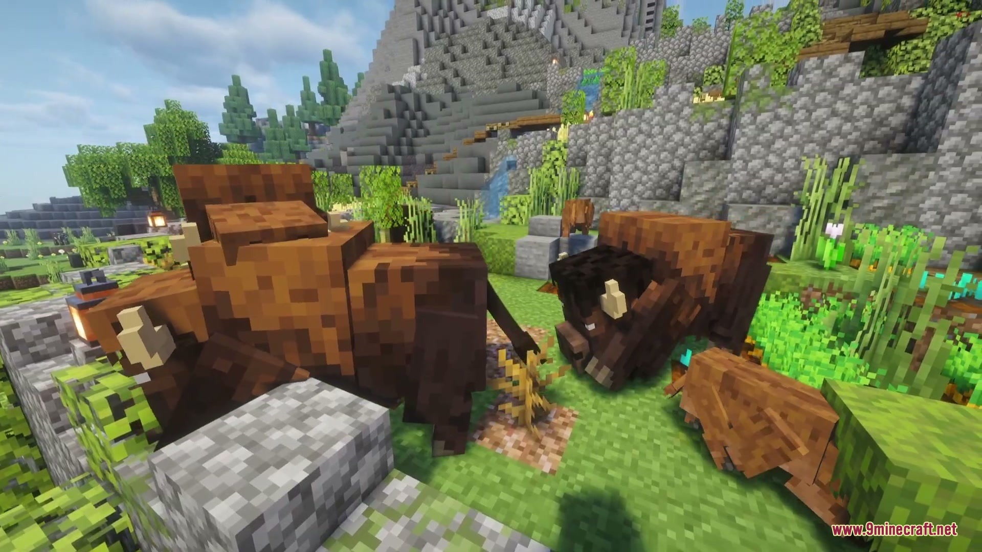 Prairie Meadow Behemoths Mod Screenshot 5 Massive wild bison standing together in a lush green Minecraft meadow