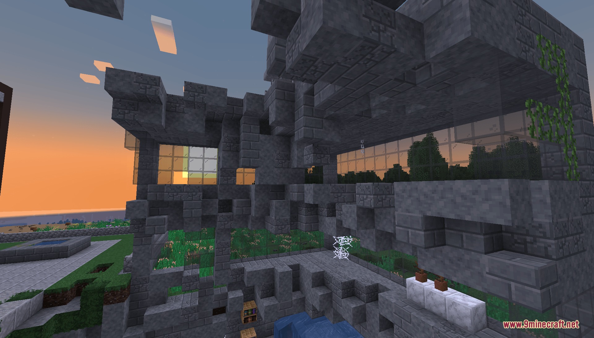 Primitive Urban Overgrowth Mod Screenshot 4 Abandoned stone structure with glass windows and vines during a sunset