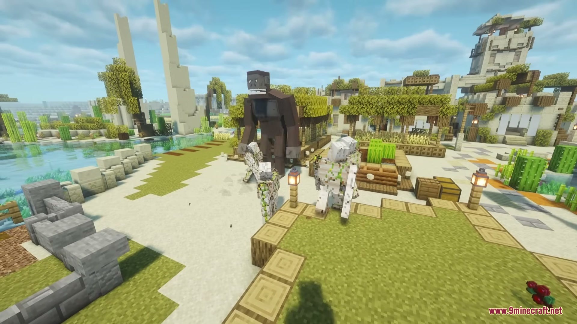 Project Big Kong Mod Screenshot 7 A giant brown ape stands near iron golems in a Minecraft village