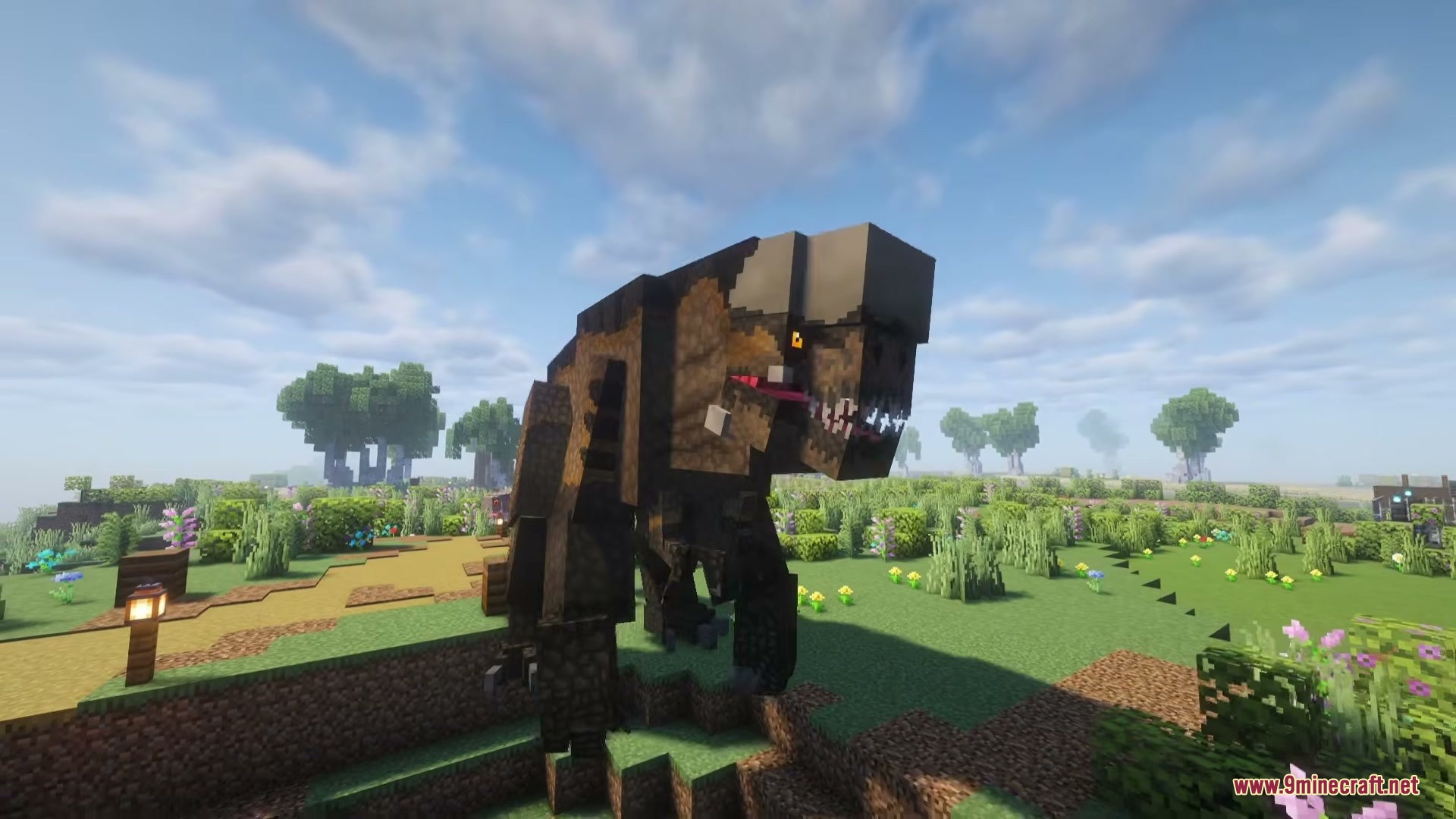 A giant dinosaur from Project Rebirth Dinosaurs Mod stands in a grassy field