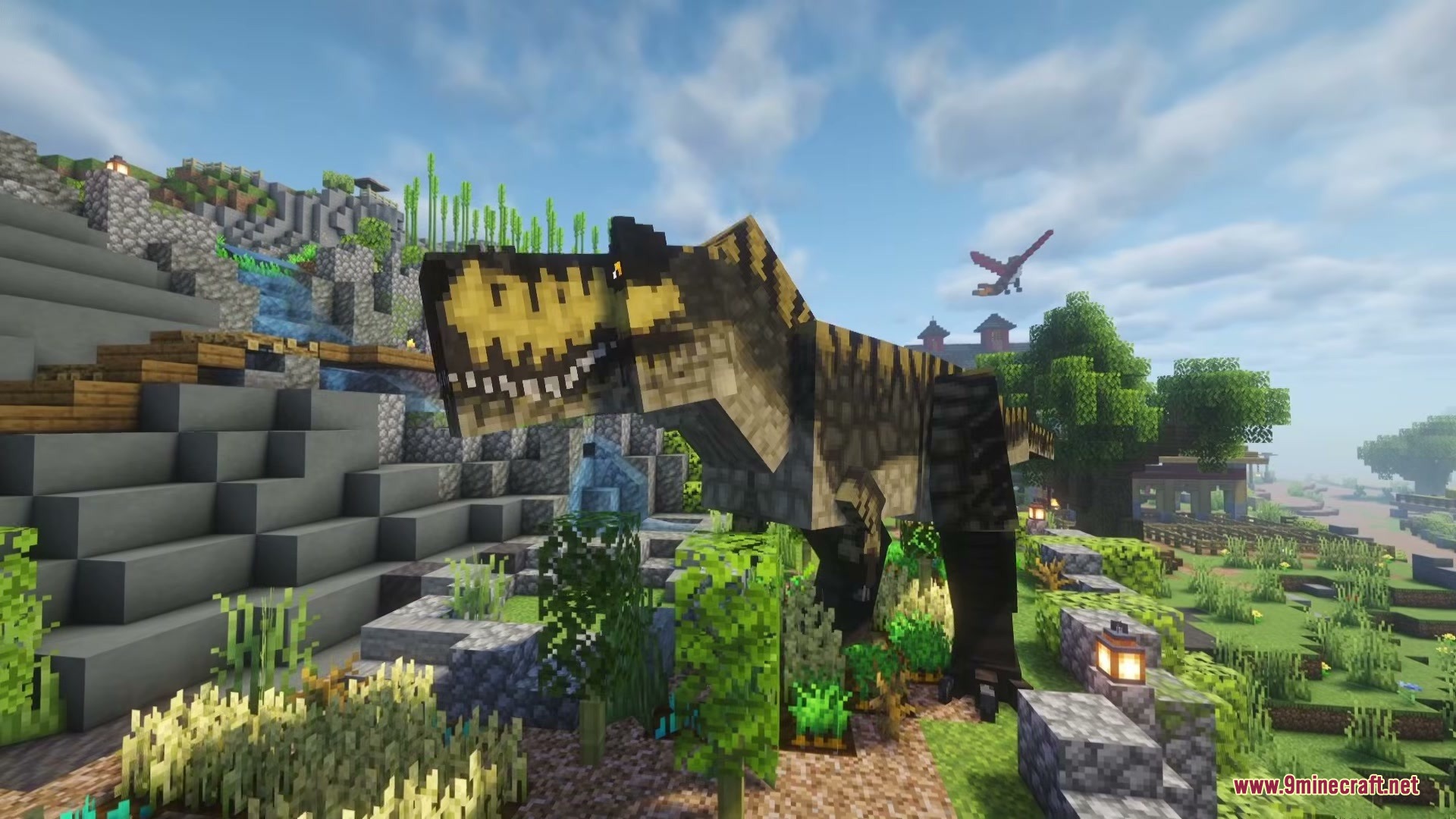 A prehistoric dinosaur explores a village garden while a flying reptile soars