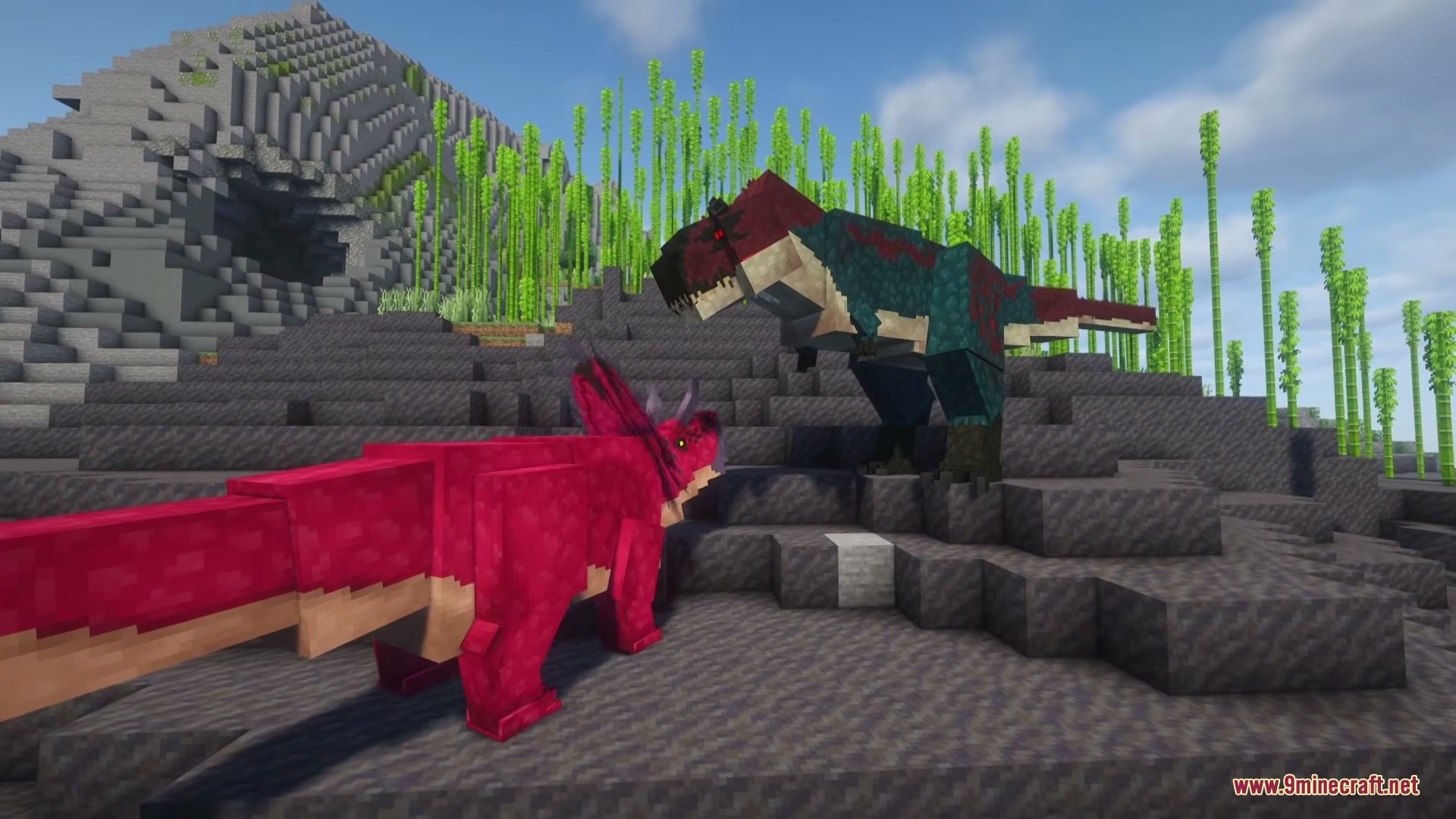 A Tyrannosaurus rex and a Triceratops face each other on a rocky slope