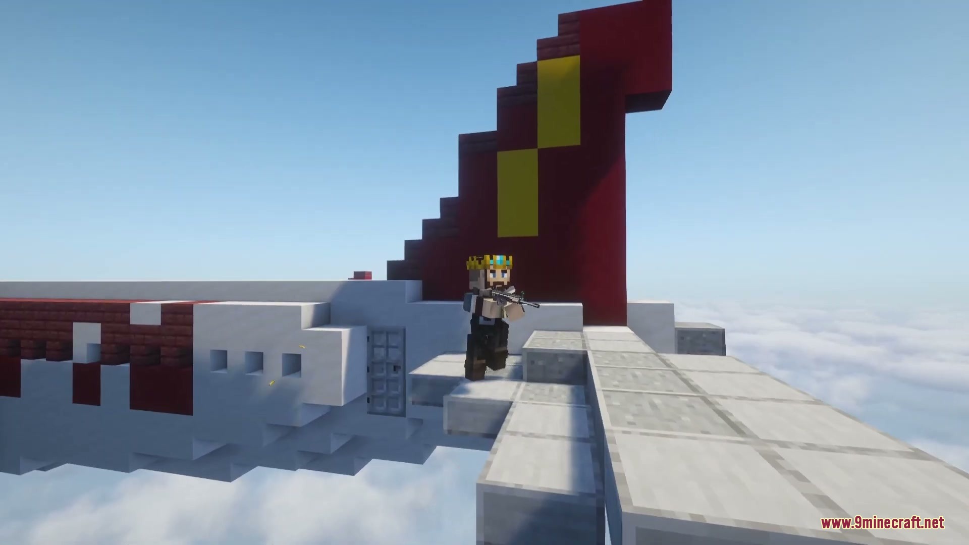 Prone Velocity Mod Screenshot 1 A Minecraft player holding a firearm while standing on a large airplane wing