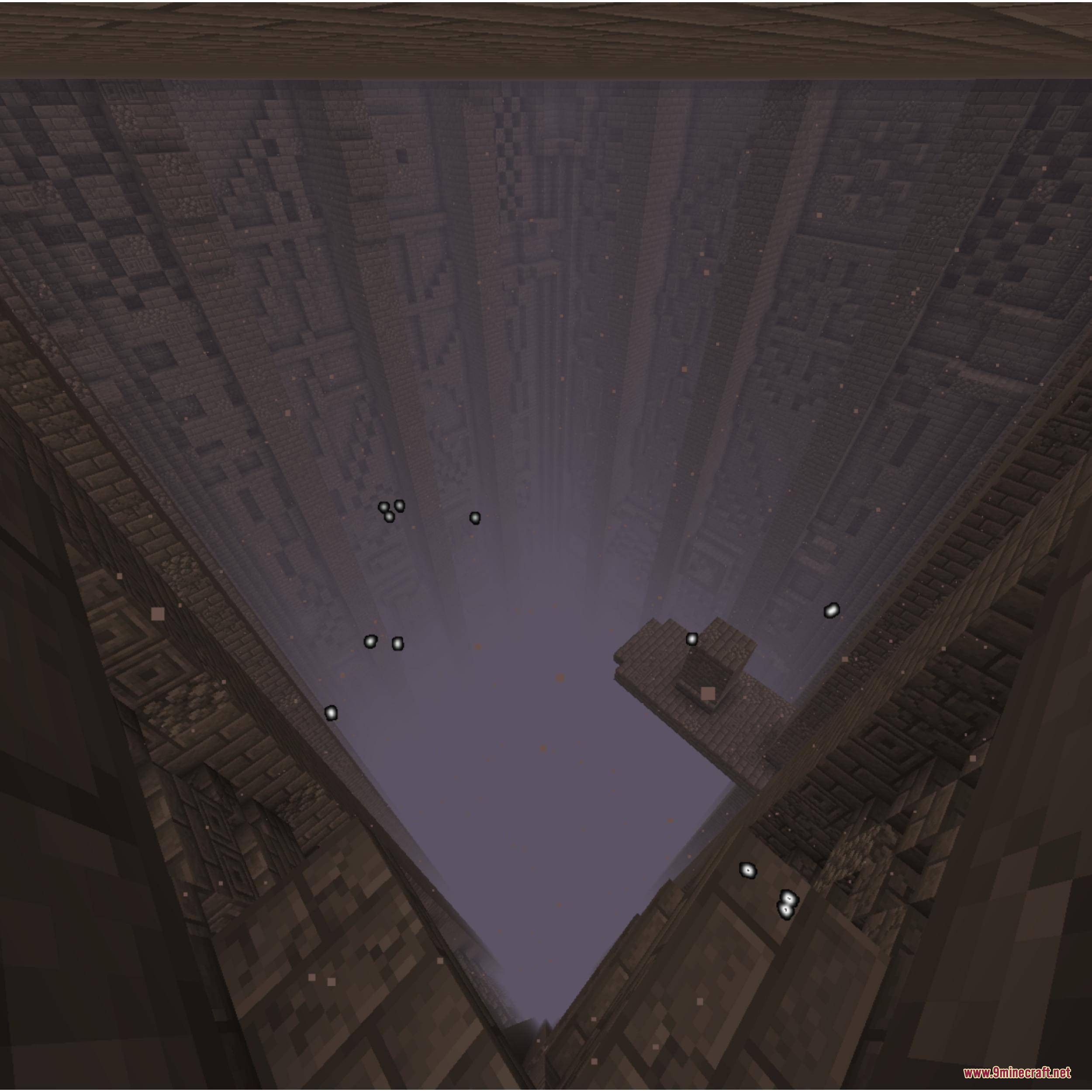Pugmeowla's Infinity Stone Core Mod Screenshot 8 Looking down into a deep vertical shaft made of patterned stone blocks