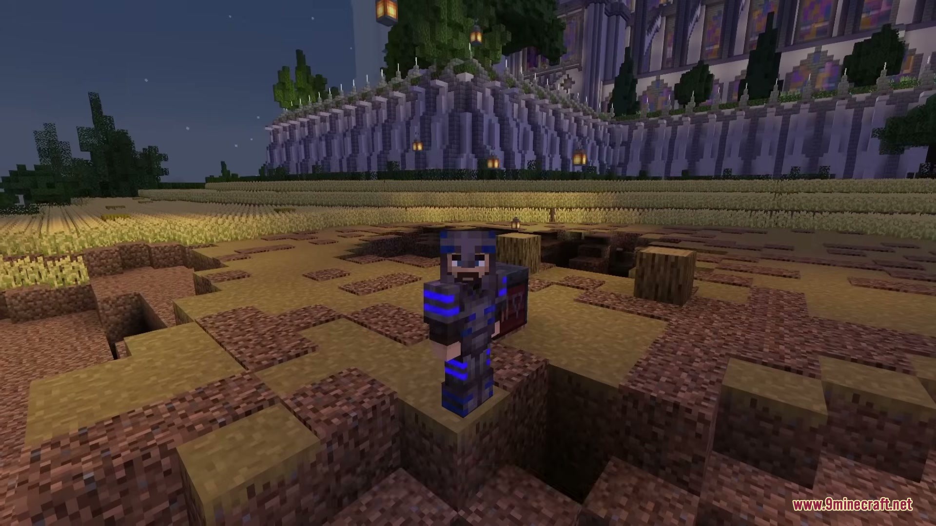 Pulse Trims Mod Screenshot 1 A player wearing armor with glowing blue pulse trims at night time