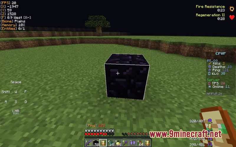 PvP Essentials Overlay Resource Pack Screenshot 3 Minecraft player holding a totem of undying while looking at an obsidian block
