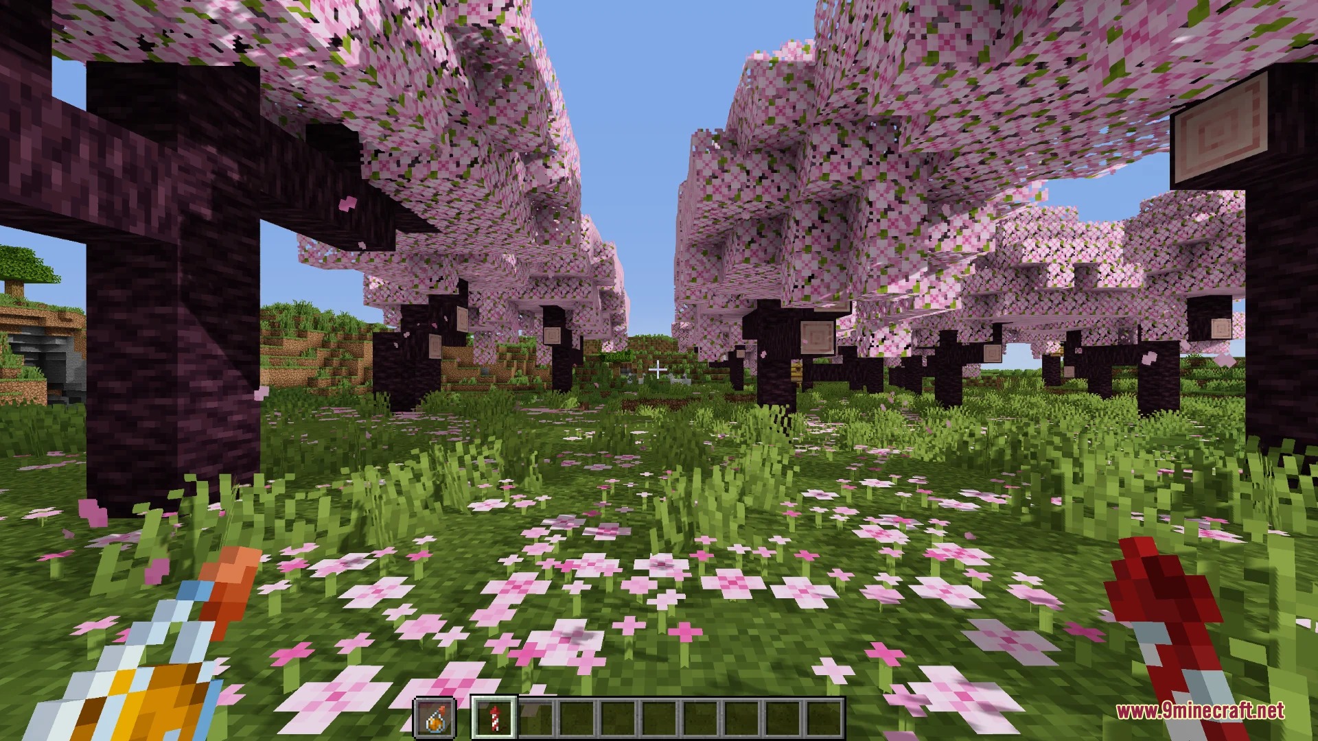 PvP Smaller Hand Helds Resource Pack Screenshot 1 Player holding a small potion and firework rocket in a cherry grove