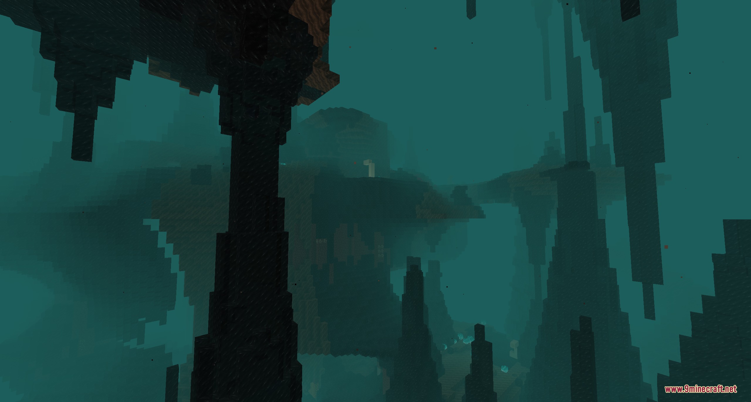 Pyrellium Mod Screenshot 6 Frostburn Valley biome with dark teal pillars and stalactites in the Nether