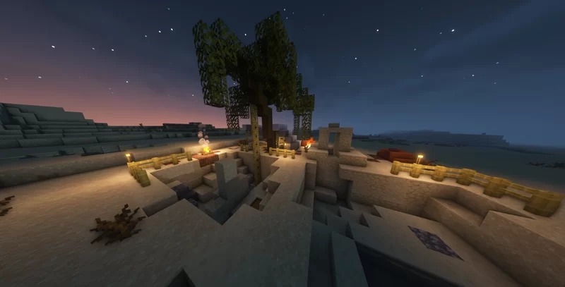 Qrafty's Archeology Dig Sites Data Pack Screenshot 1 A desert archeology dig site with a campfire and fences at night time