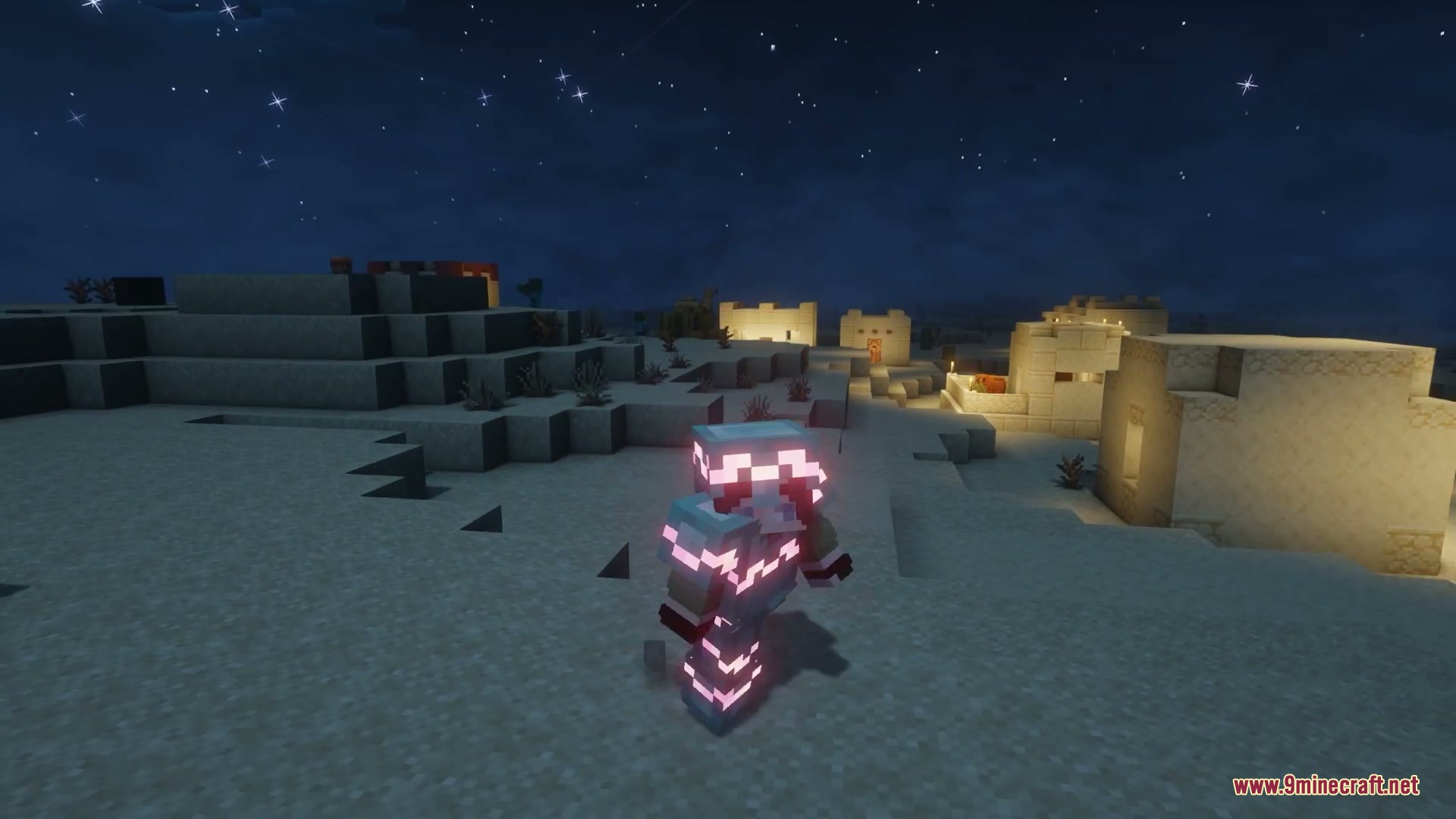 A player wearing armor with glowing trims at night in a desert village