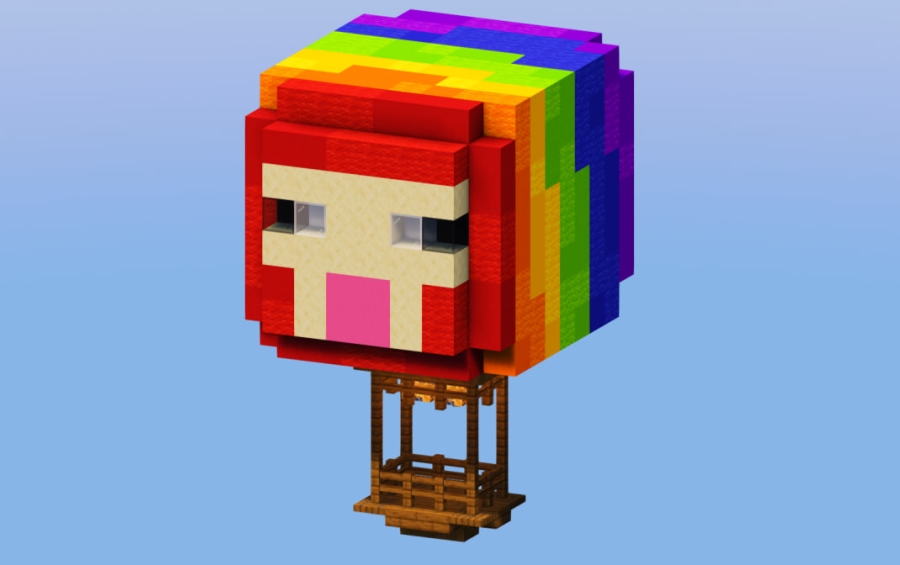A colorful rainbow sheep head hot air balloon floating in the sky