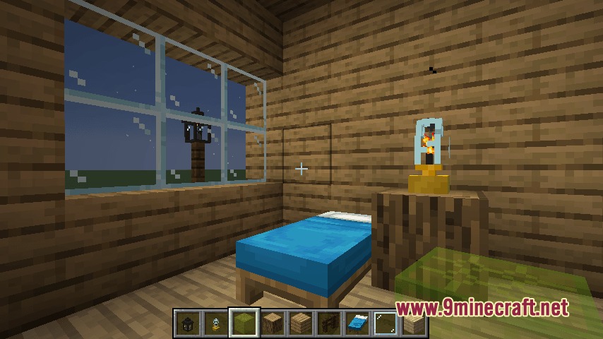 Cozy wooden bedroom interior featuring a blue bed and a chemical flask lamp
