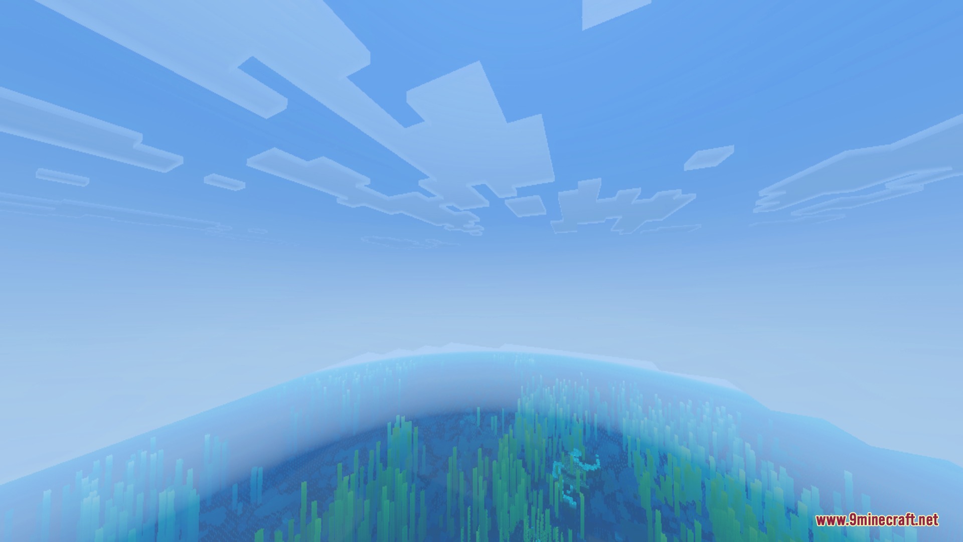 A vast ocean with kelp visible through a bright blue night vision filter