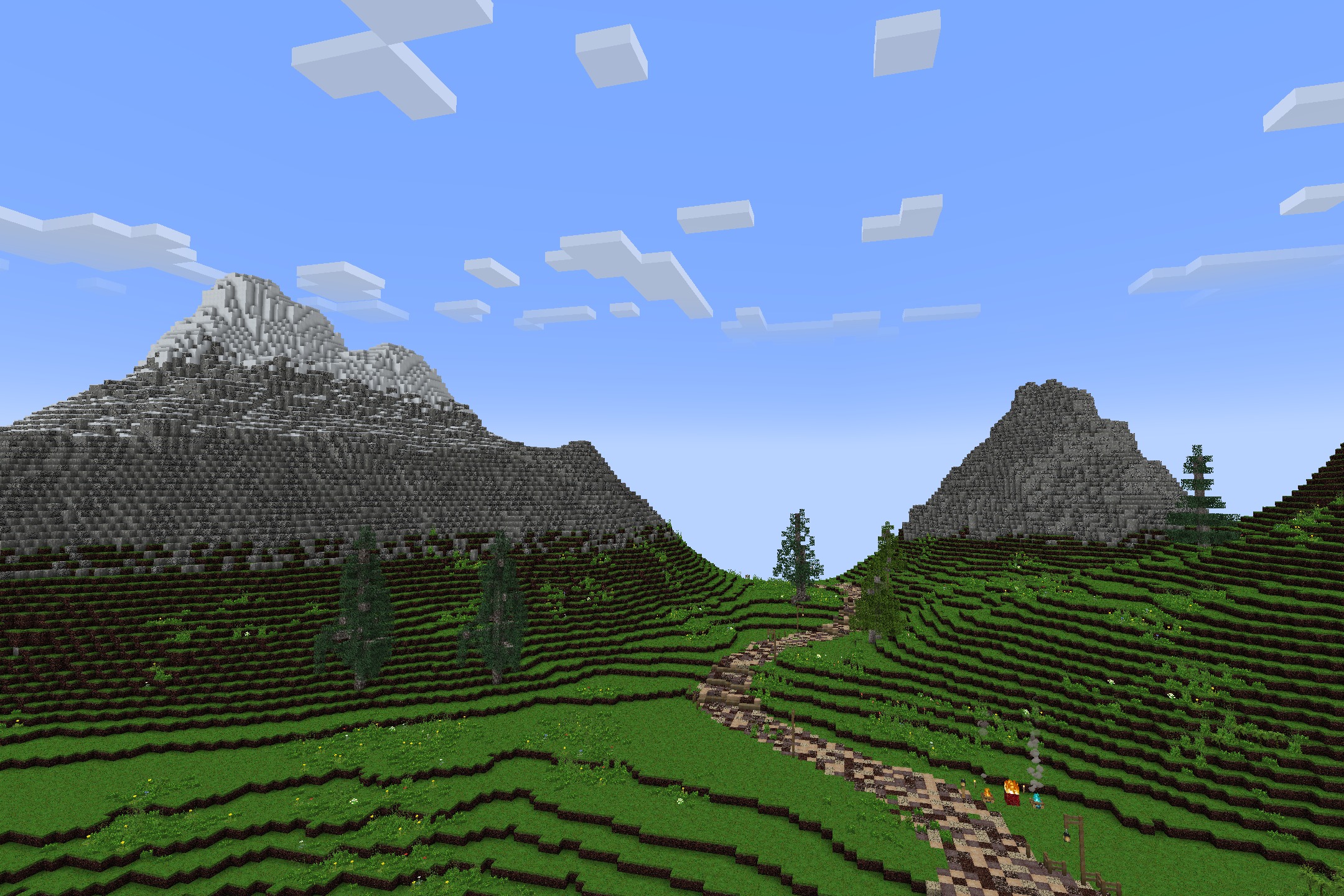 Realism Upscaled Resource Pack Screenshot 6 Winding stone path through a lush green valley with high resolution mountains