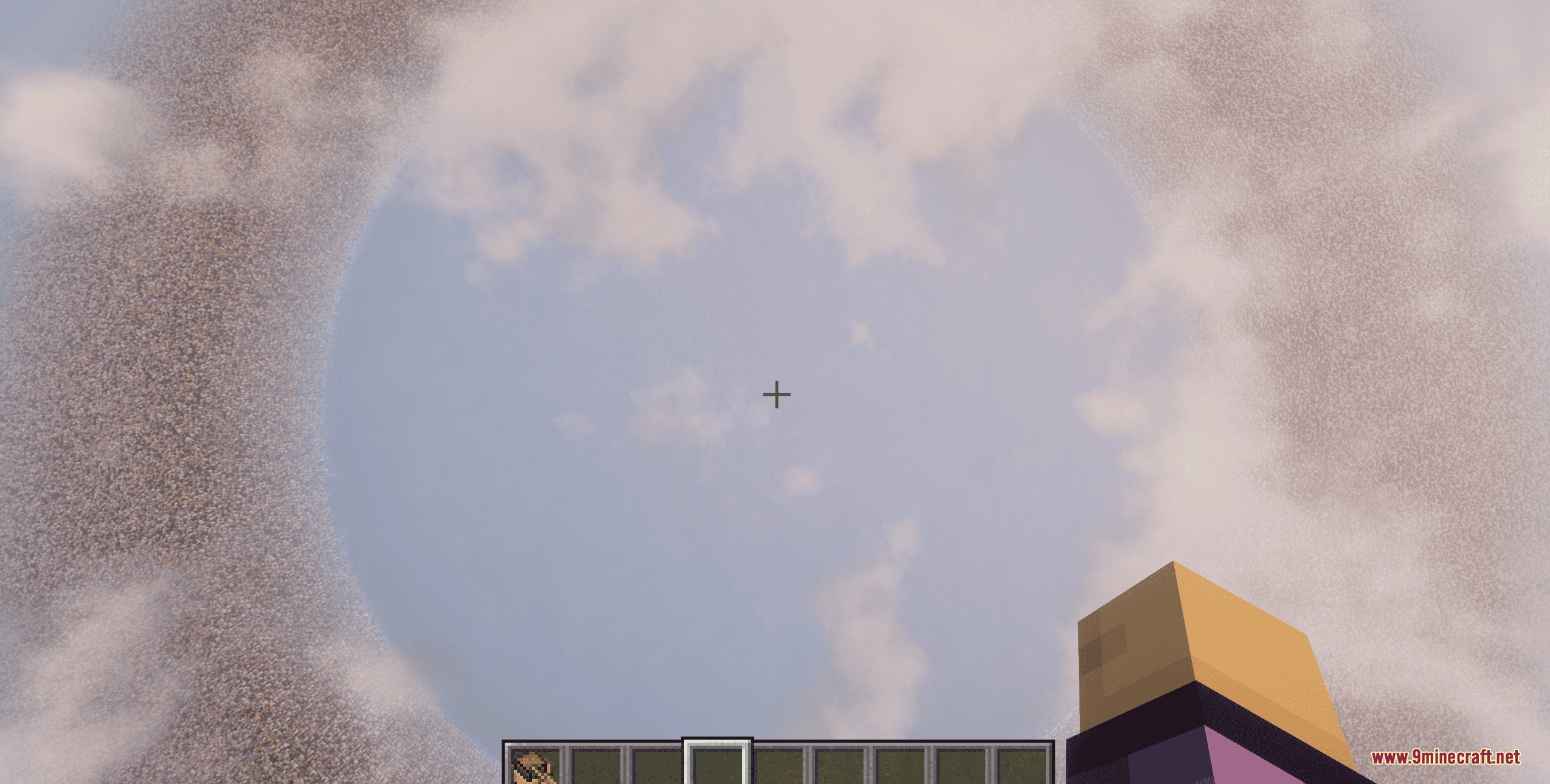Looking up at the sky from the bottom of a massive circular crater