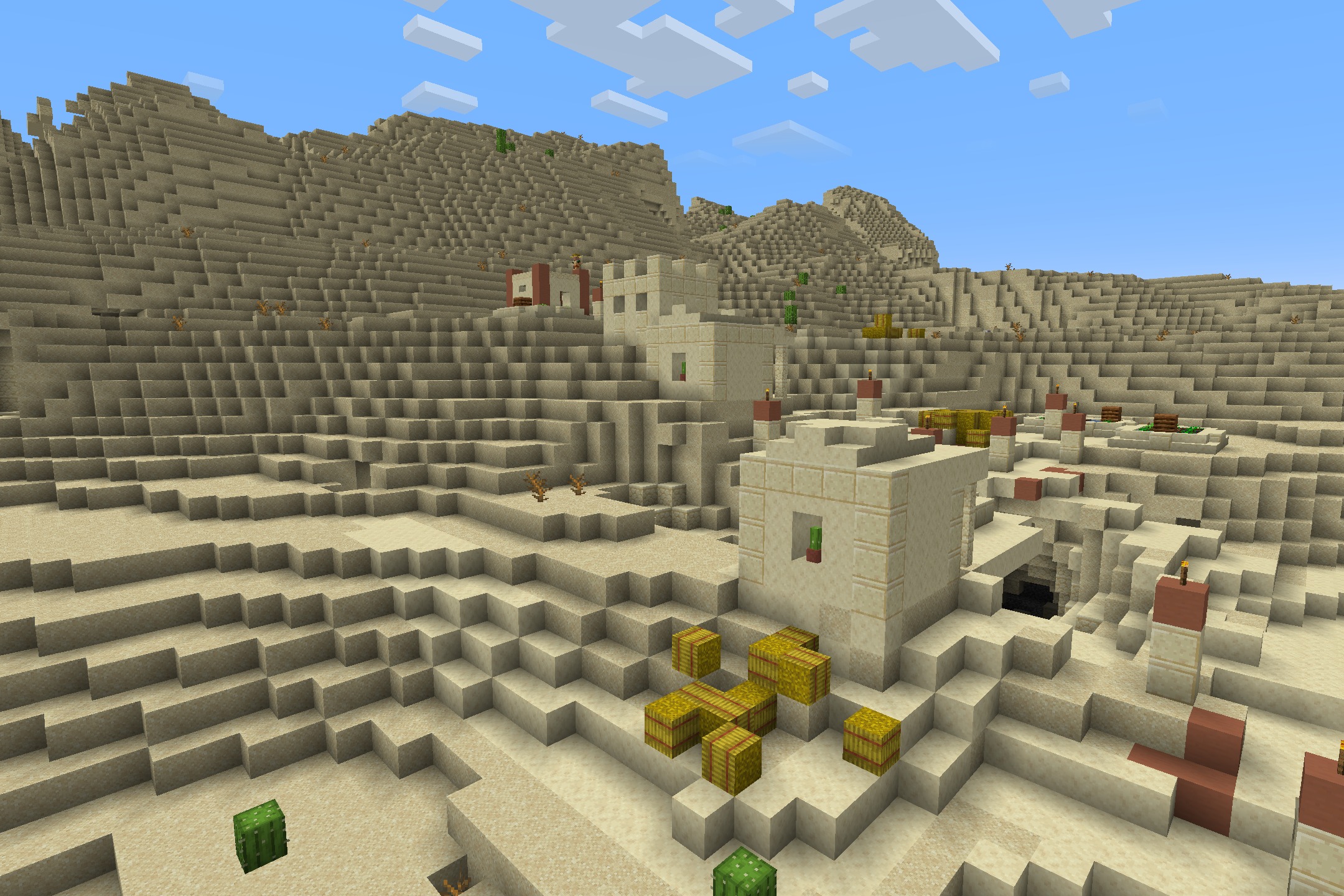Realtastic X512 PBR POM Resource Pack Screenshot 5 Detailed sandstone buildings and hay bales in a sunny desert village biome