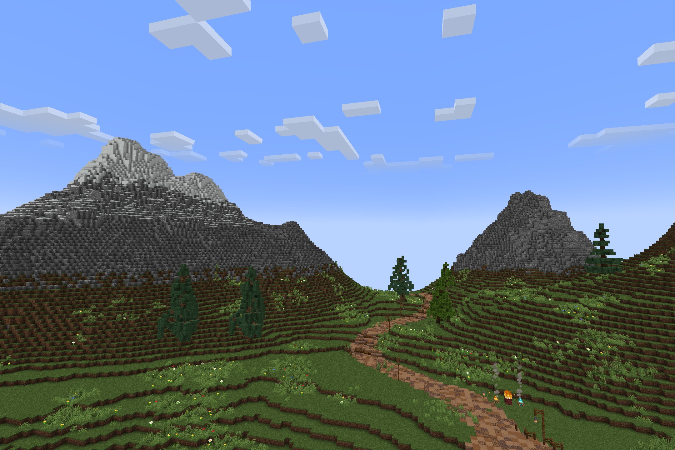 Realtastic X512 PBR POM Resource Pack Screenshot 6 A winding dirt path through green hills with distant high resolution mountains
