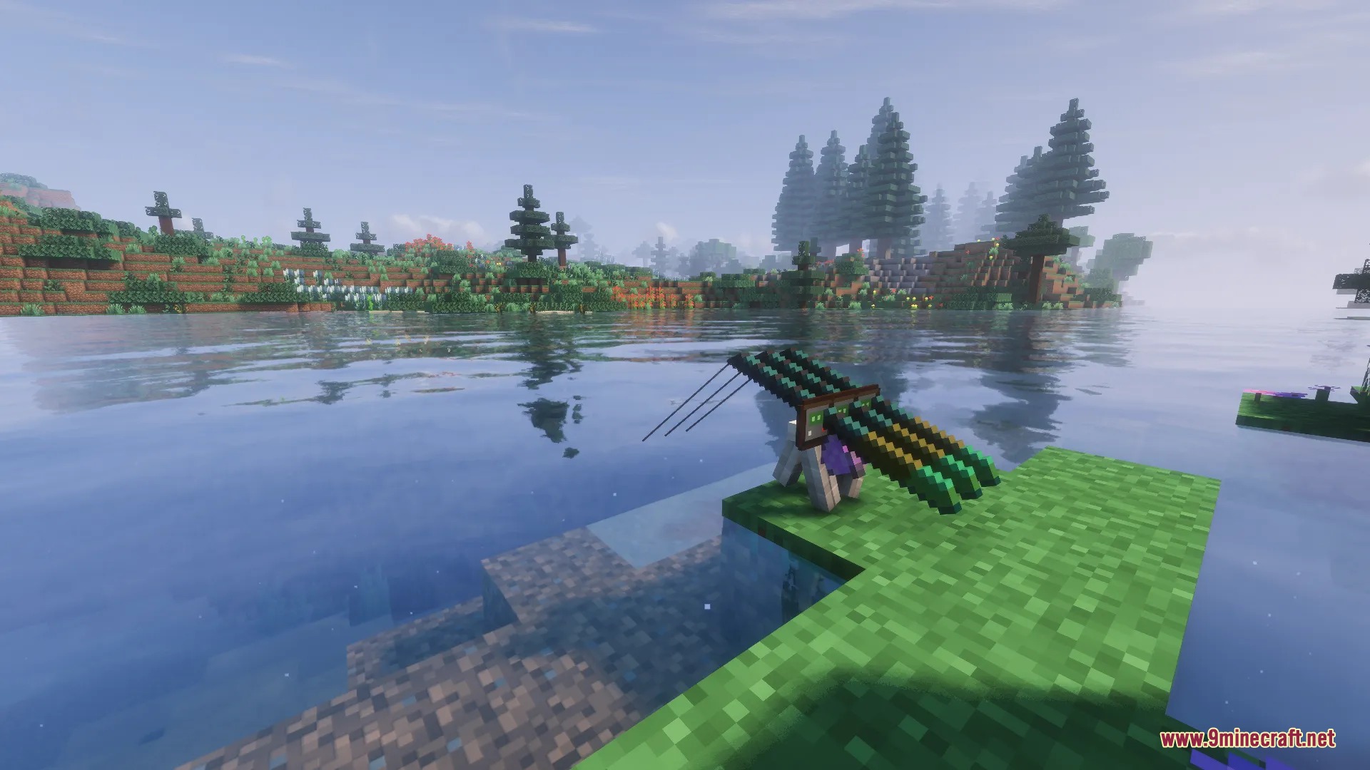 River Fishing Mod Screenshot 3 A custom fishing rod assembly sits on a grassy bank near the water