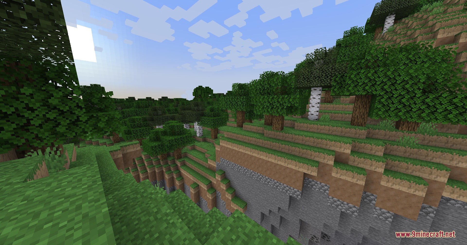 Rocks Done Right Mod Screenshot 3 A scenic forest biome featuring steep cliffs with realistic layered soil and stone
