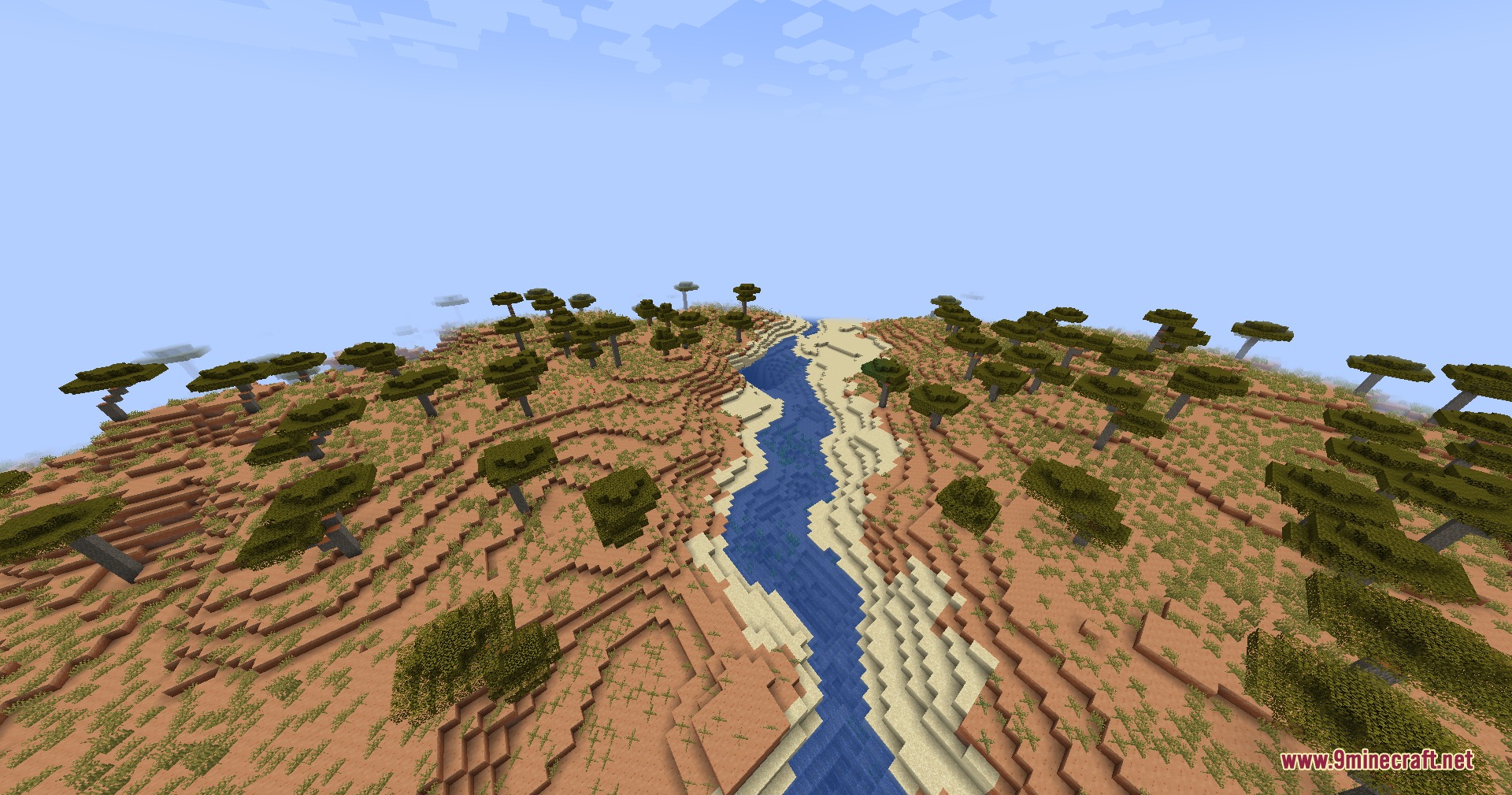 Rocks Done Right Mod Screenshot 6 A river flowing through a savanna biome with realistic layered soil blocks