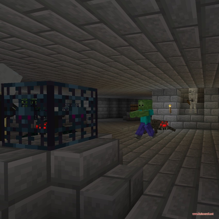 A zombie and spider roam a stone brick dungeon with a monster spawner